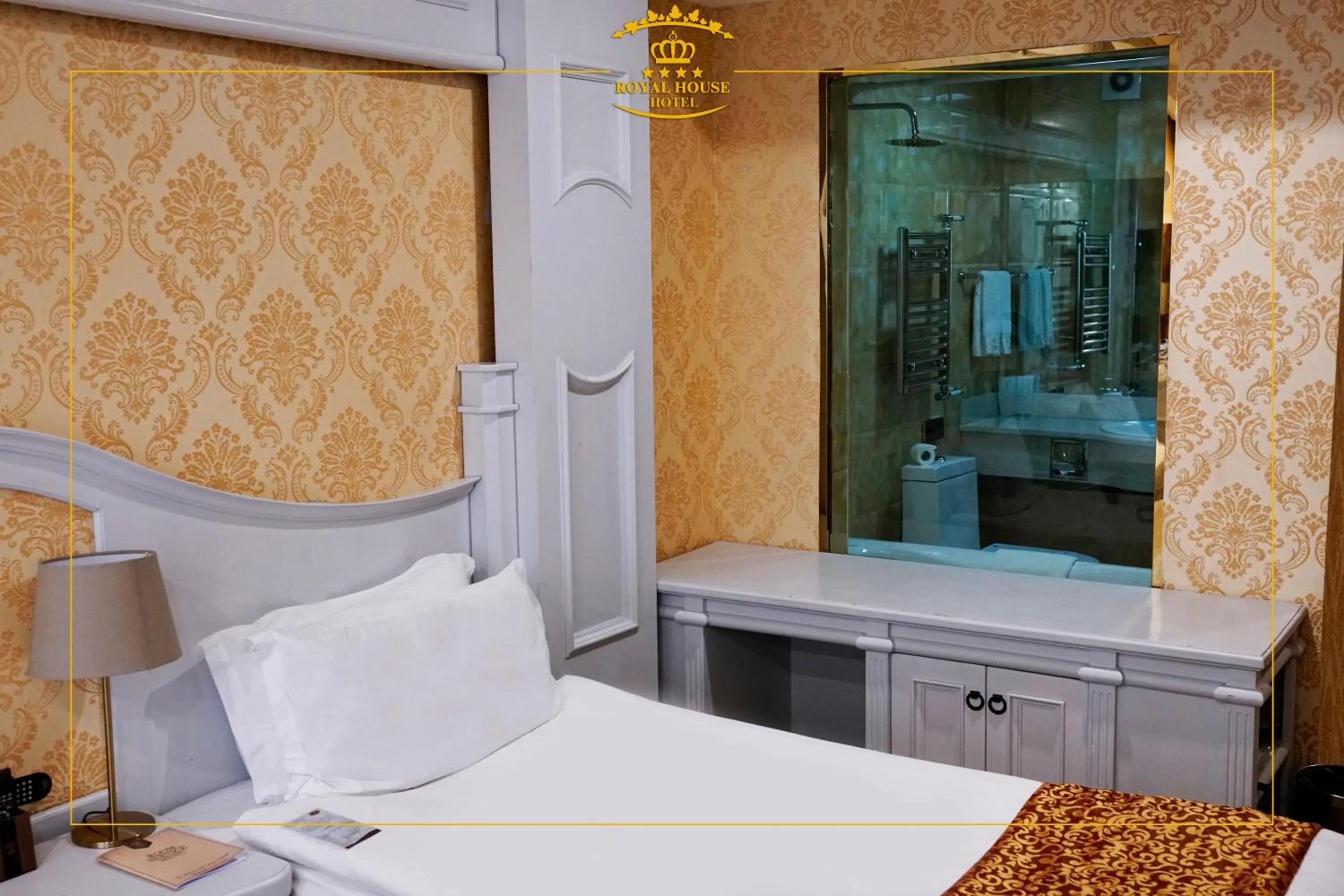 Bed in Royal House Hotel 2