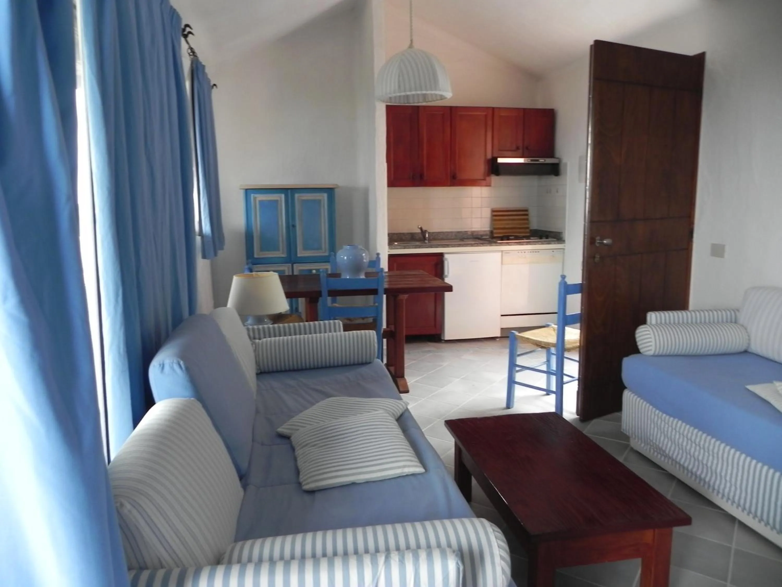 Living room, Bed in Residence I Cormorani Bis