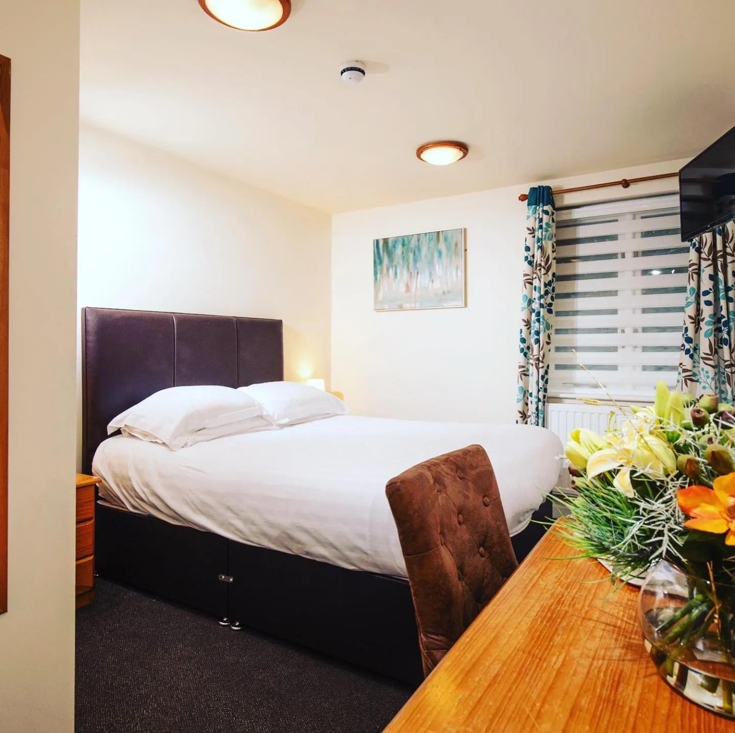 Bed in The Cock Inn Hotel