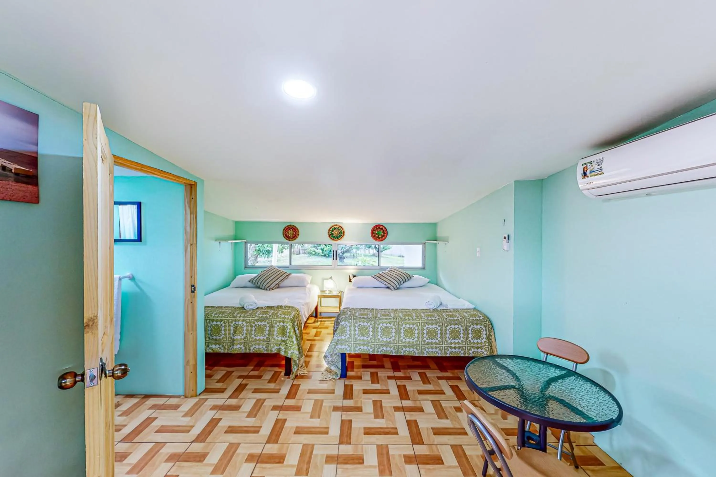 Bed in Nueva Villa Paraíso Four Villas