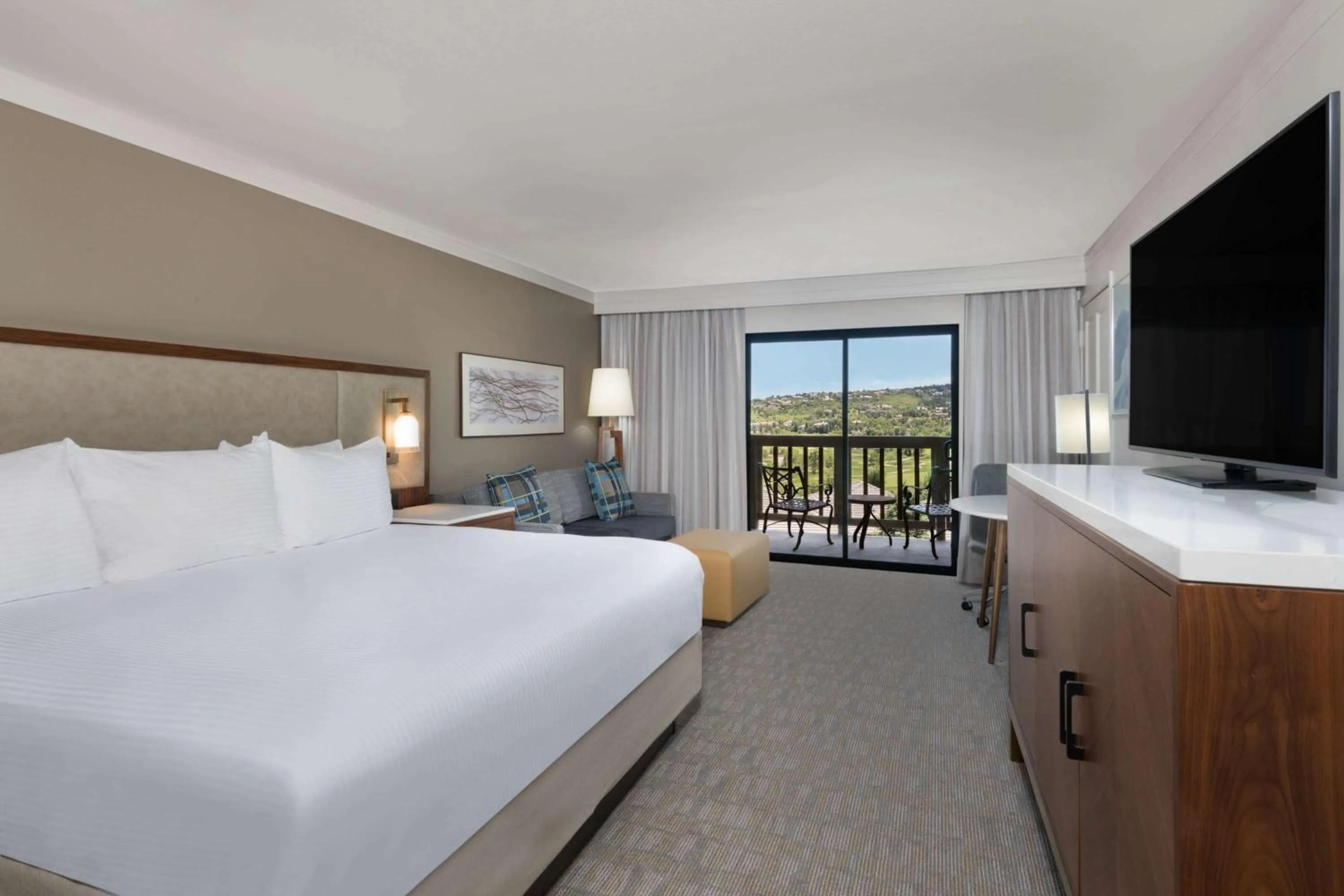Seating area, Bed in Cheyenne Mountain Resort, a Destination by Hyatt Hotels