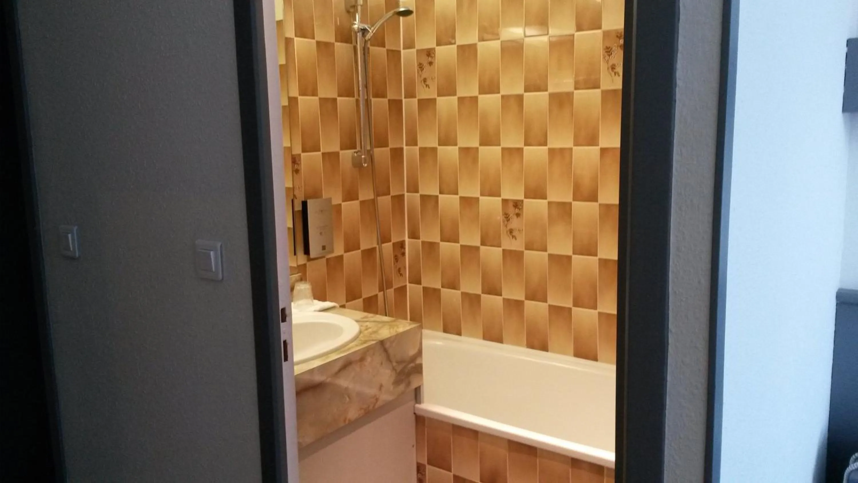 Seating area in Hôtel de La Cloche