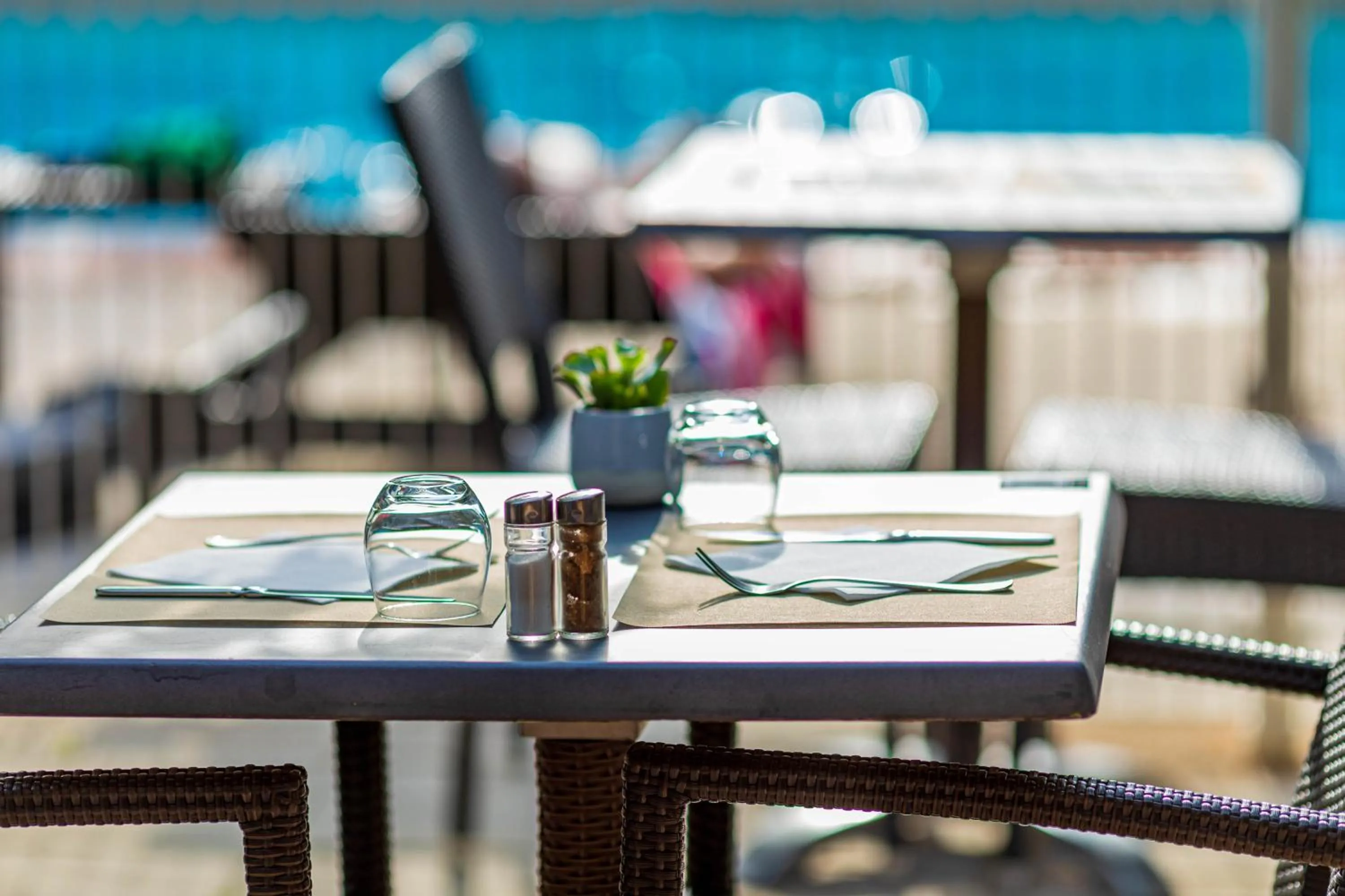 Patio in Logis Hotel Noemys pont de l'Etoile