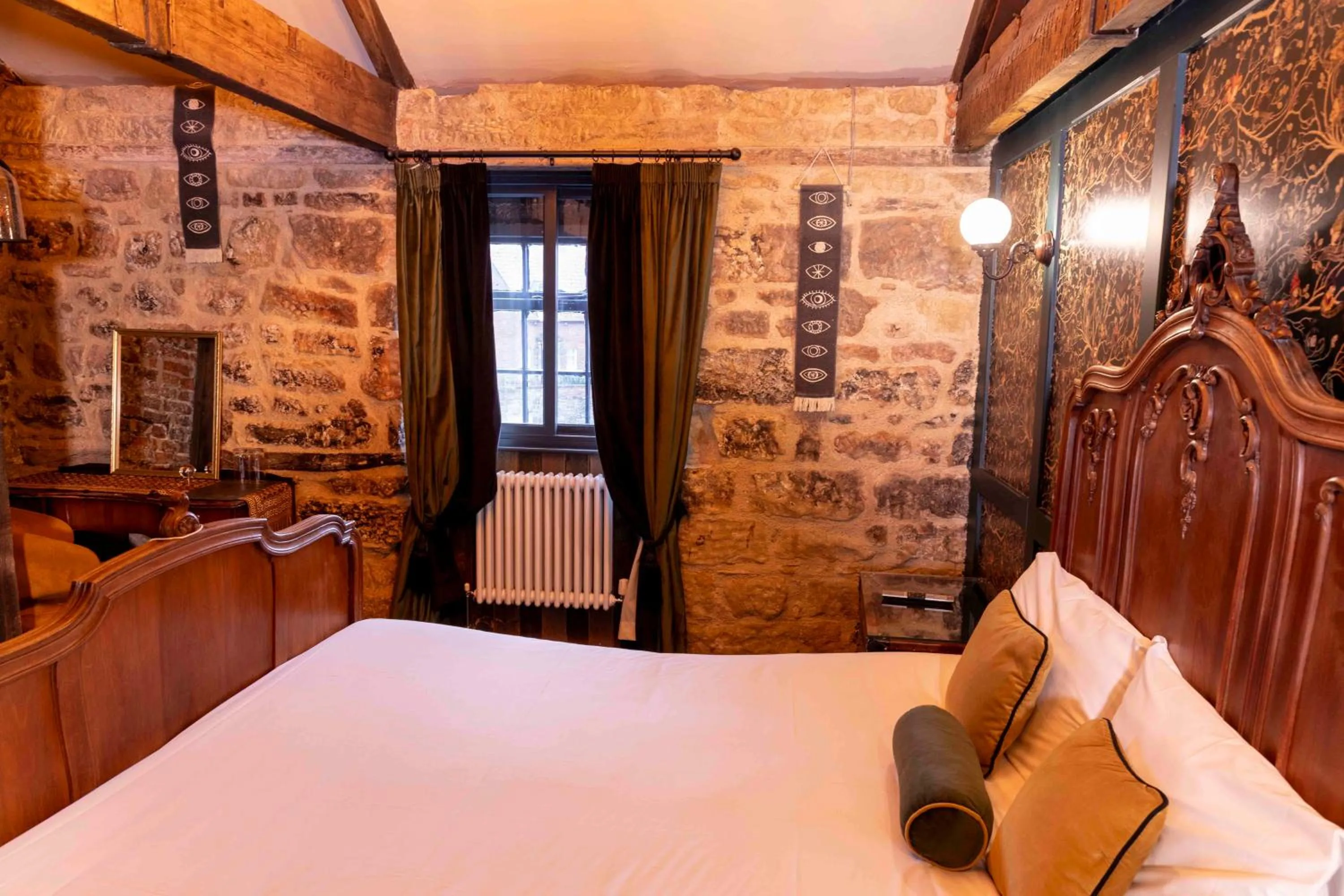 Bed in The Dirty Bottles Hotel