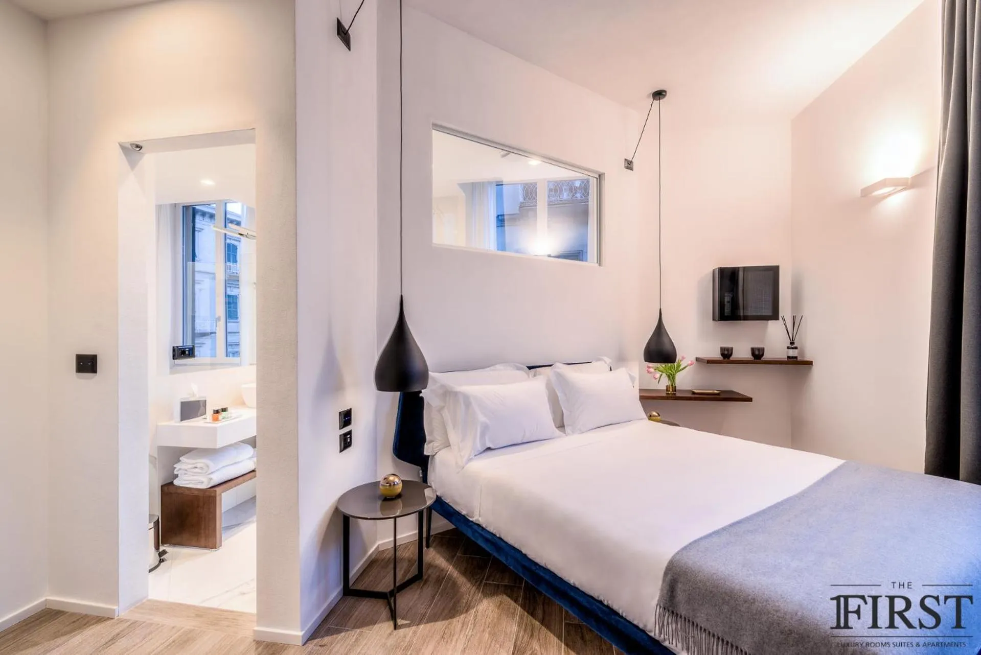 Photo of the whole room, Bed in La Spezia by The First - Luxury Rooms & Suites