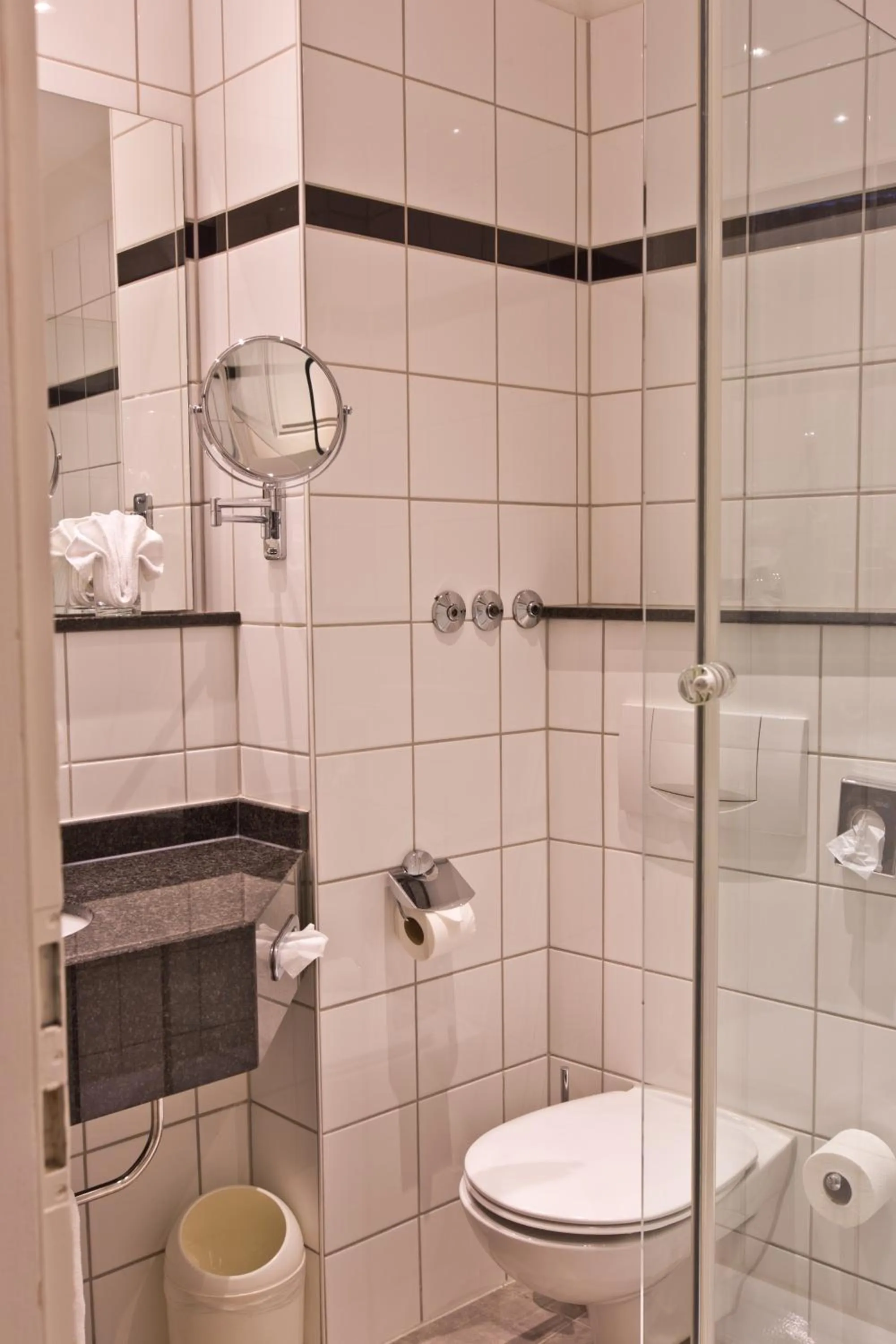 Bathroom in Astor & Aparthotel