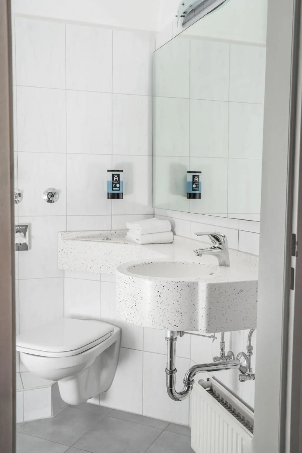 Bathroom in Astor & Aparthotel