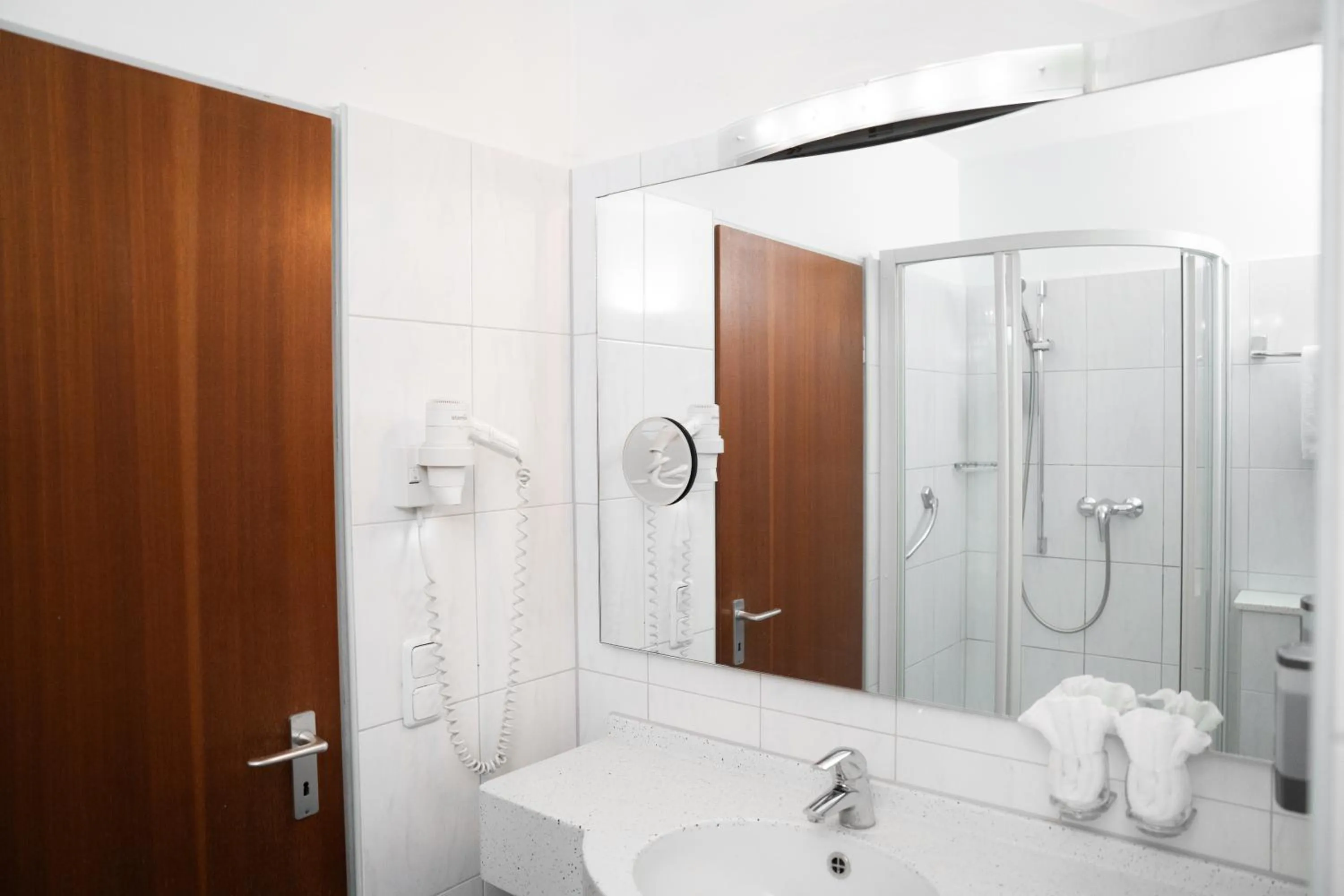 Bathroom in Astor & Aparthotel