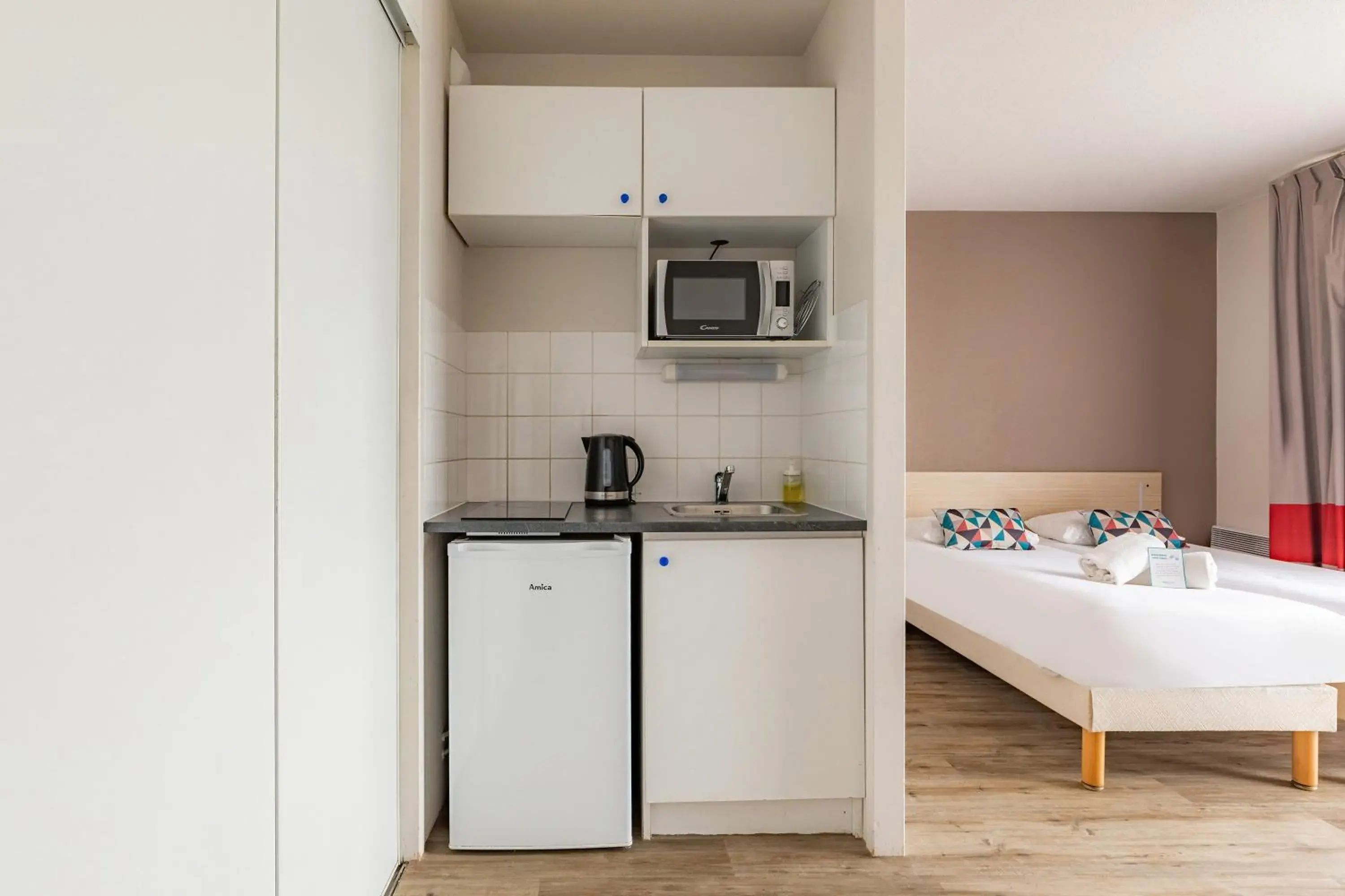 Bed in Appart'City Classic La Rochelle Centre Bed in Appart'City Classic La Rochelle Centre