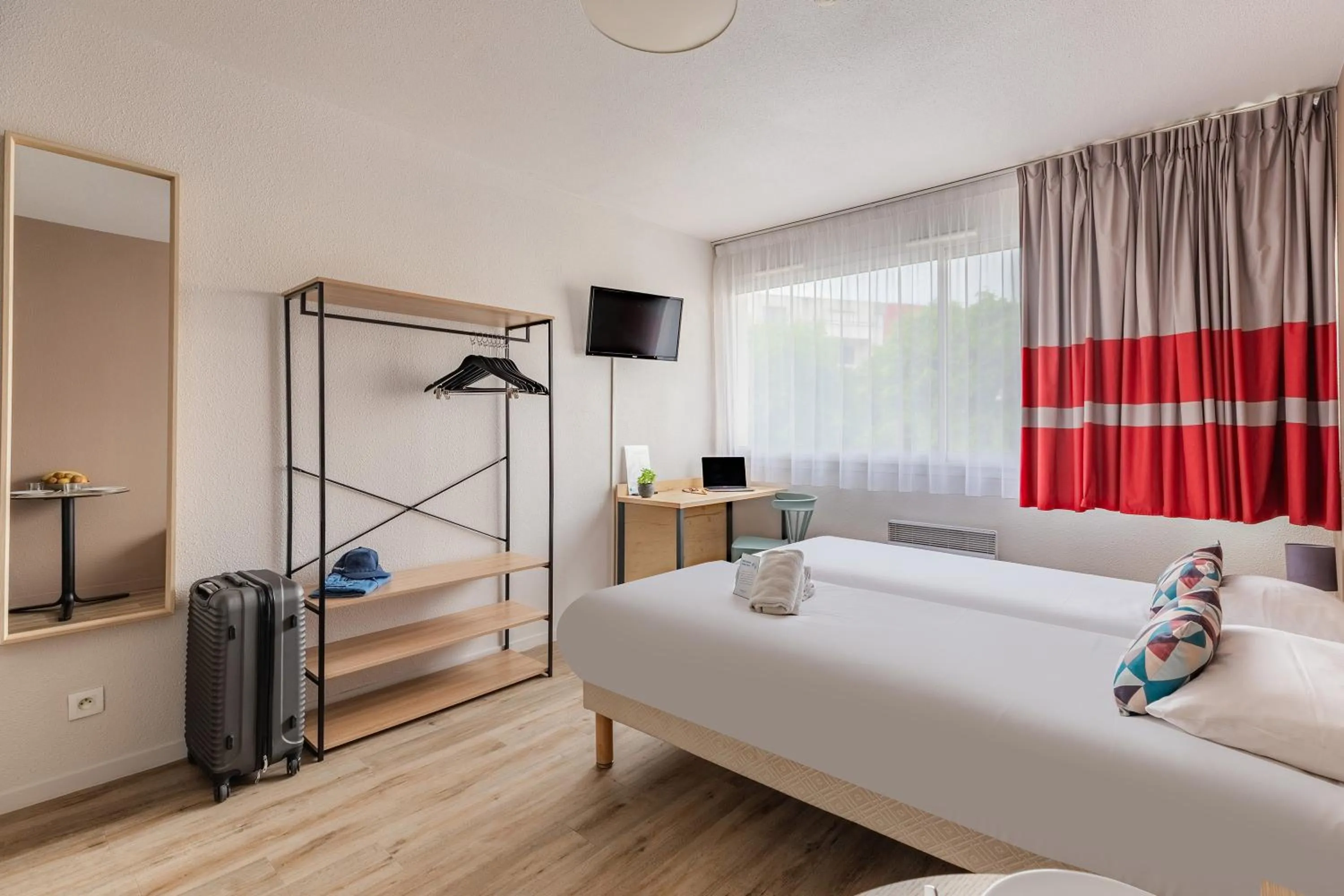 Bed in Appart'City Classic La Rochelle Centre