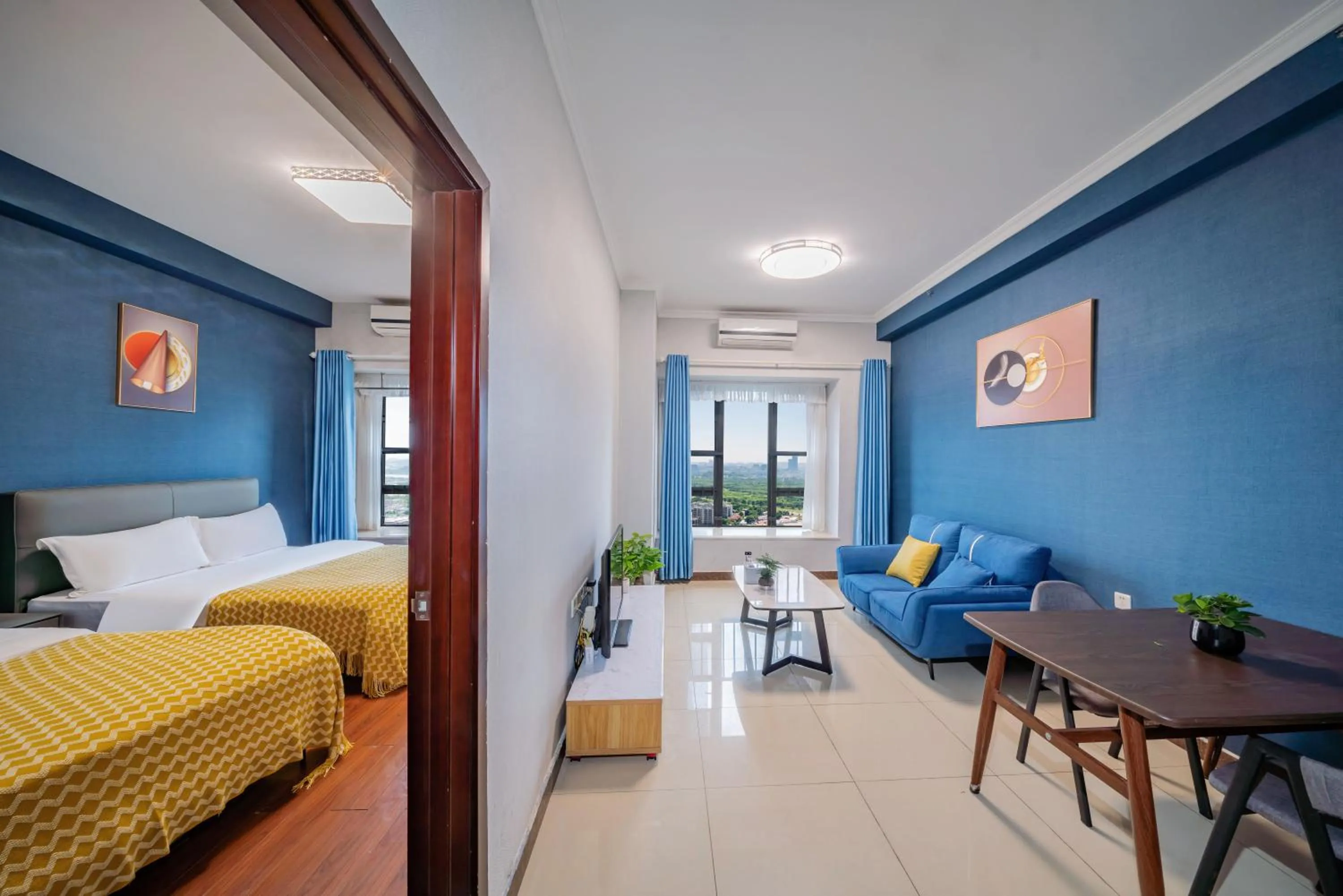 Living room, Bed in Pazhou Angda International Aparthotel Canton Fair Branch