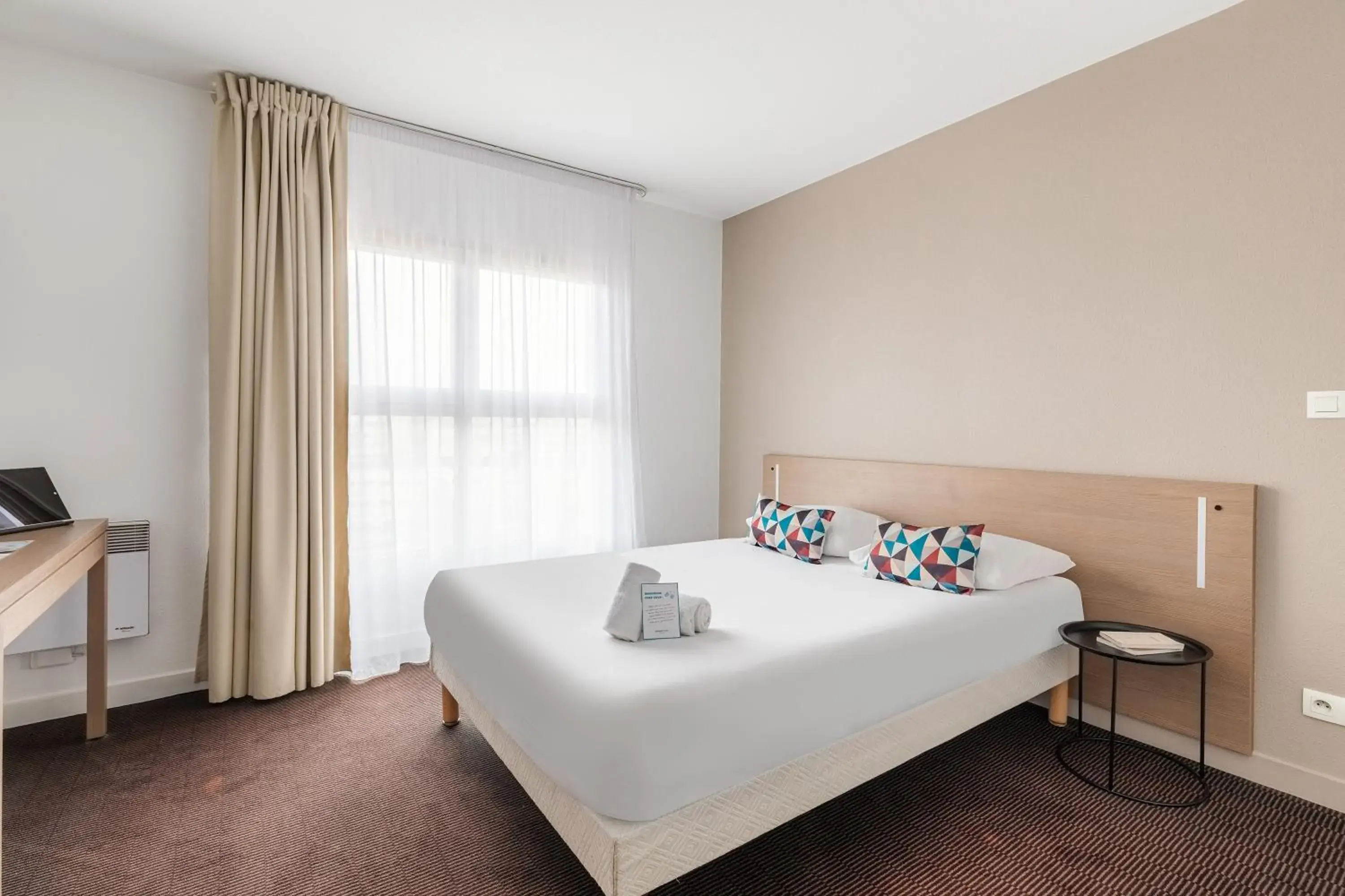 Bed in Appart'City Classic Lyon Part Dieu Villette Bed in Appart'City Classic Lyon Part Dieu Villette