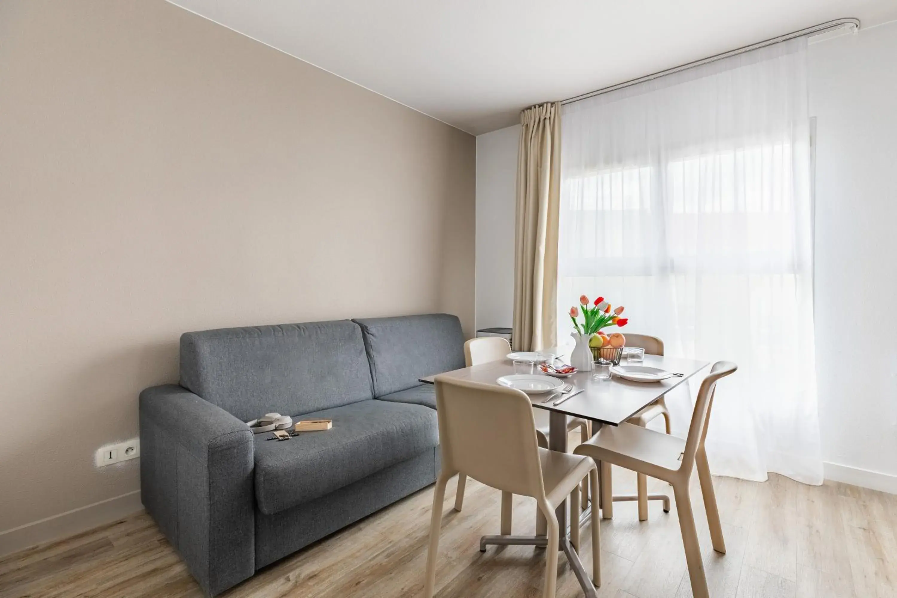 Living room in Appart'City Classic Lyon Part Dieu Villette Living room in Appart'City Classic Lyon Part Dieu Villette
