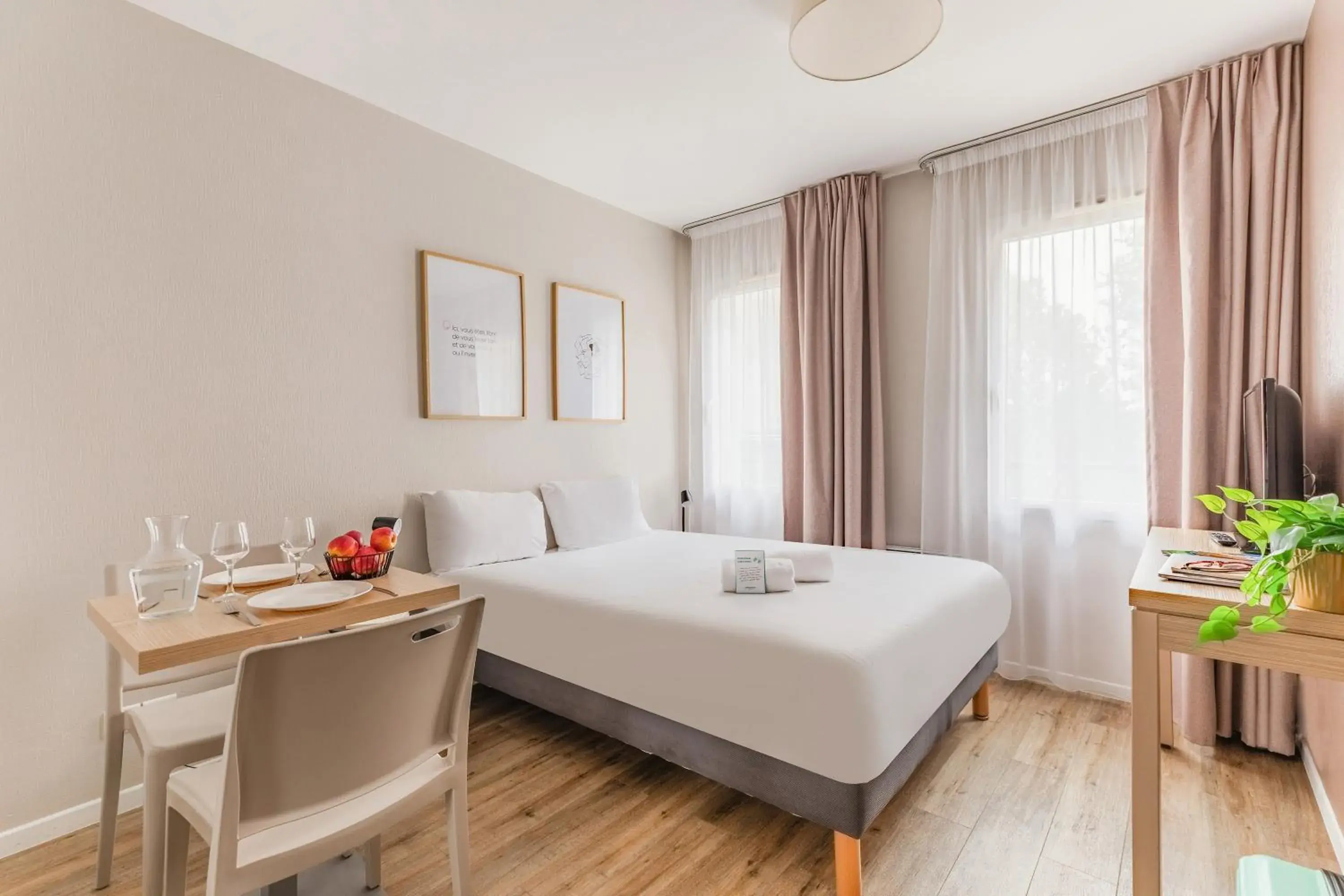 Bed in Appart'City Classic Nantes Quais de Loire Bed in Appart'City Classic Nantes Quais de Loire