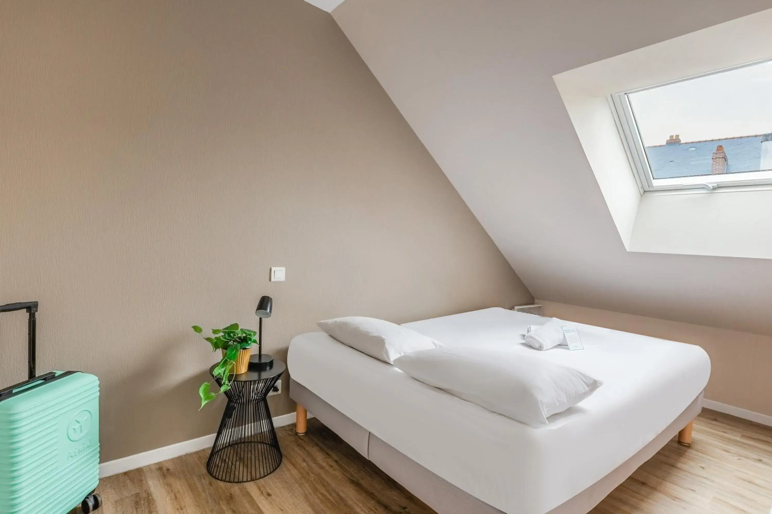 Bed in Appart'City Classic Nantes Quais de Loire Bed in Appart'City Classic Nantes Quais de Loire