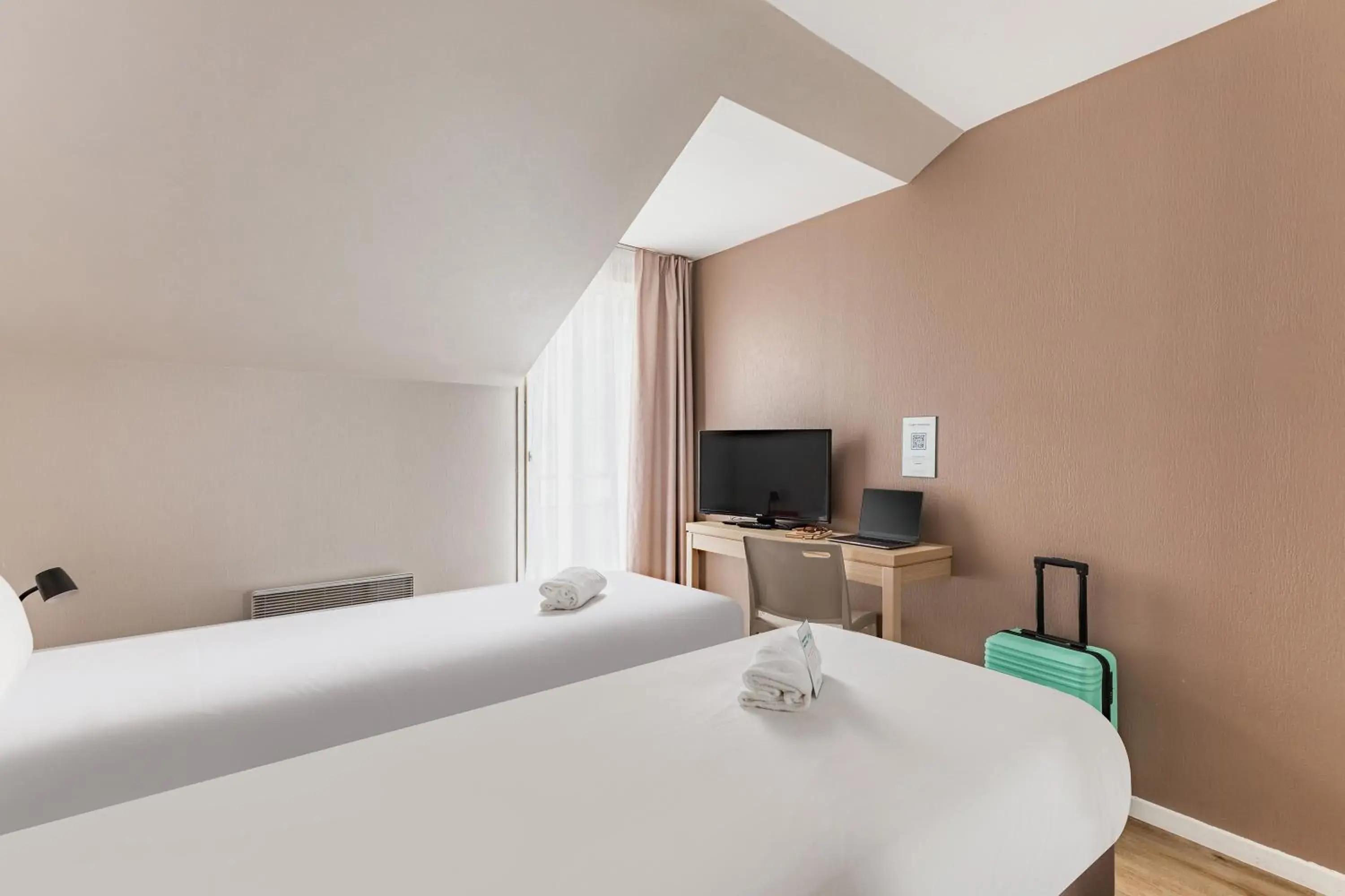 Bed in Appart'City Classic Nantes Quais de Loire Bed in Appart'City Classic Nantes Quais de Loire