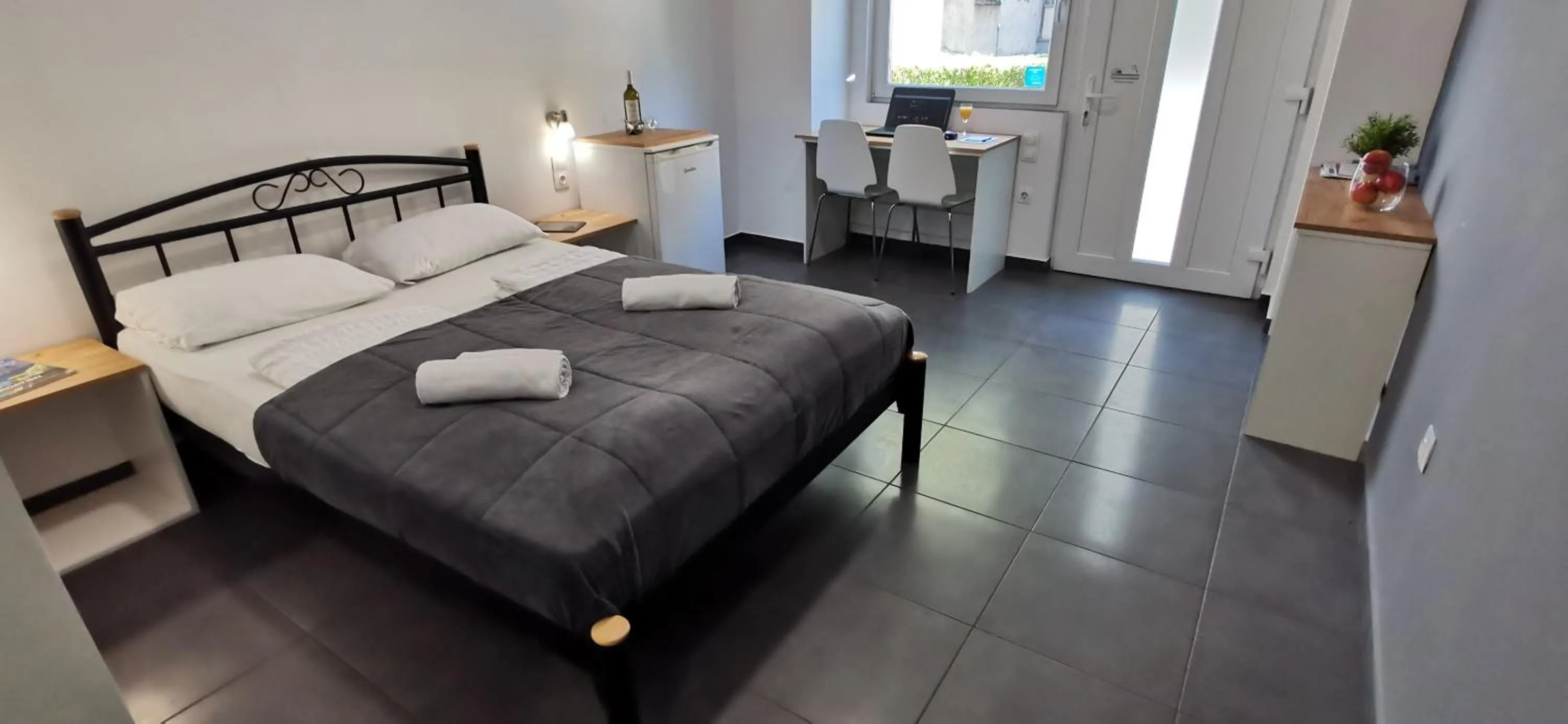Bed in Apartments Cindra
