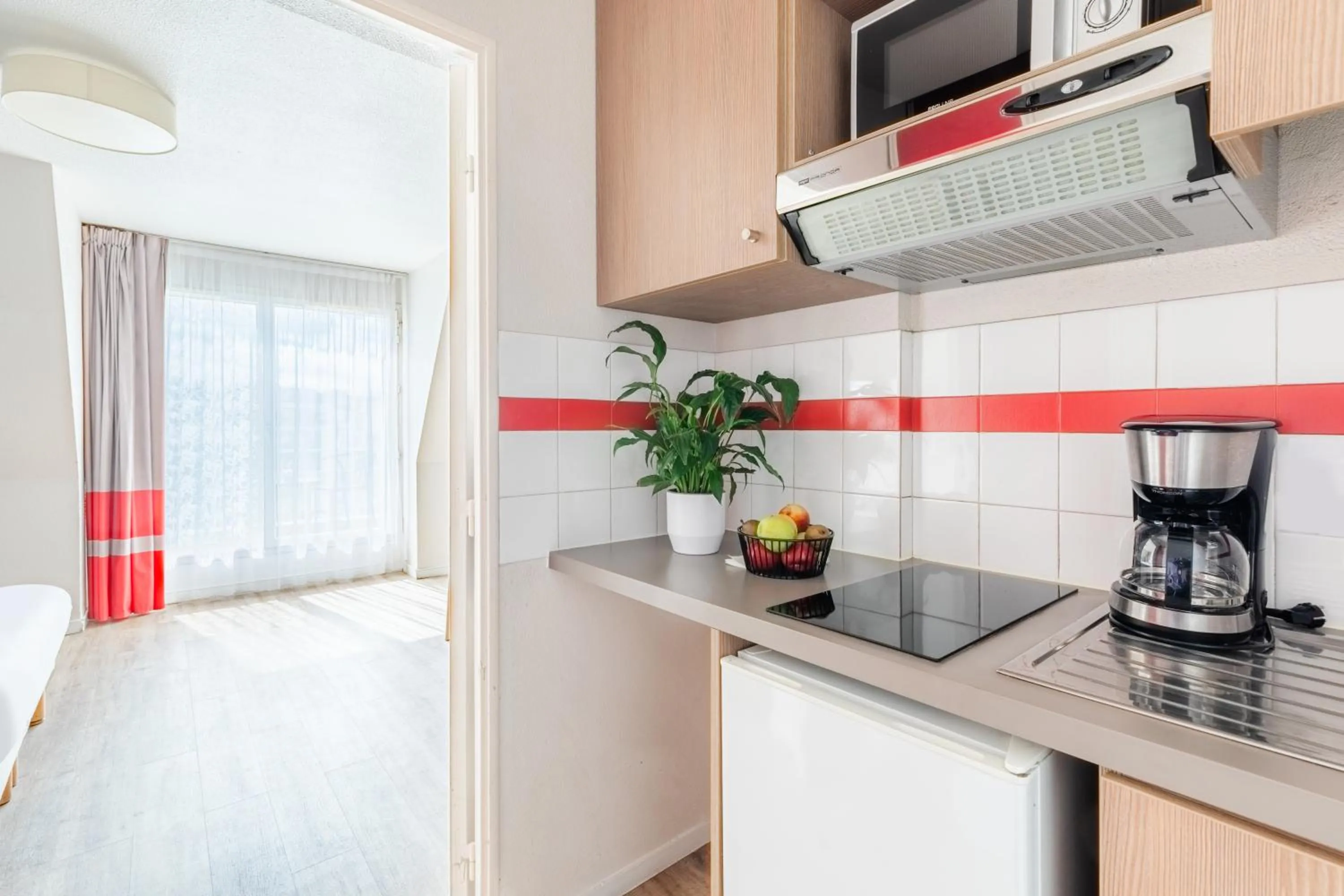 Kitchen or kitchenette in Appart'City Classic Paris La Villette