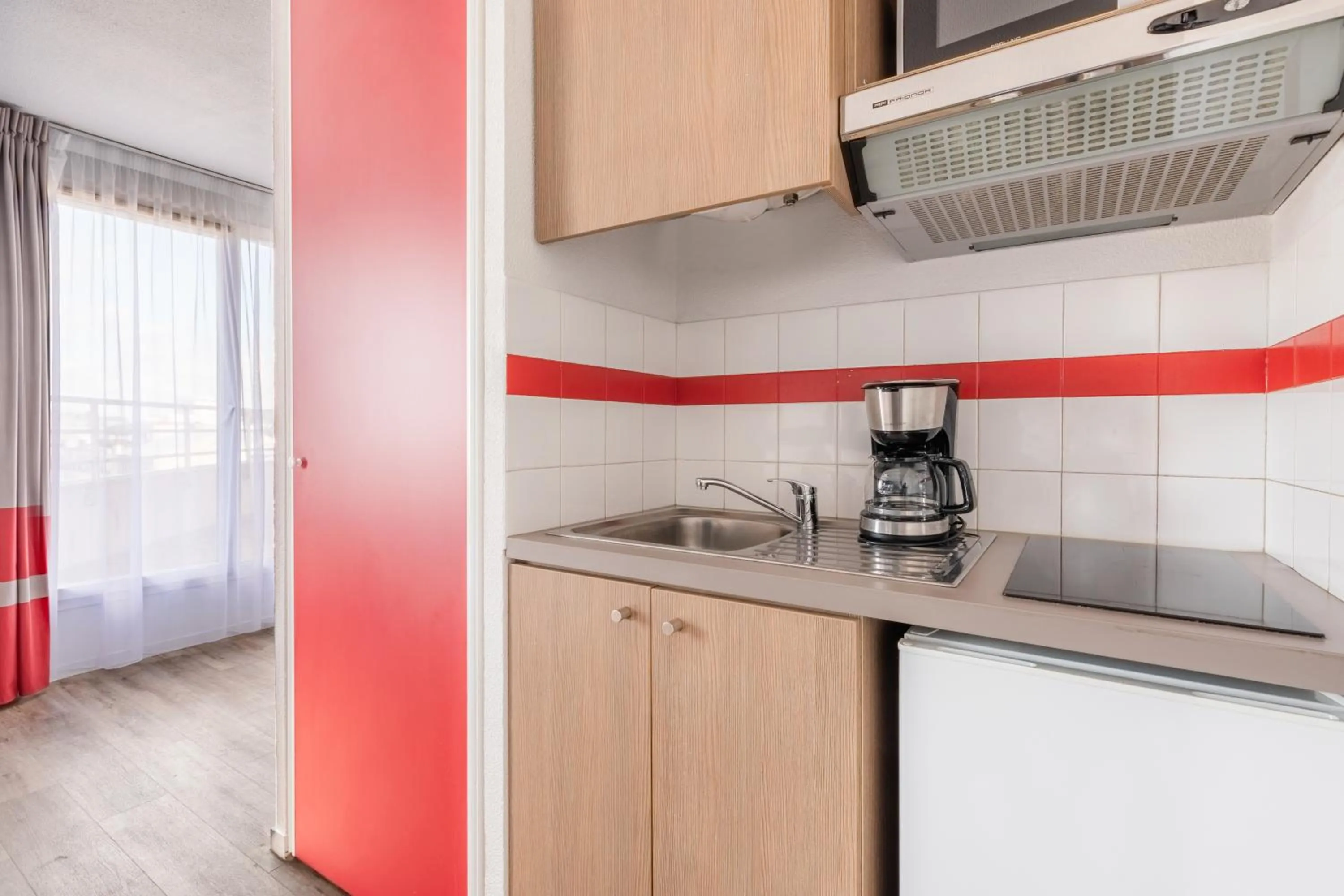 Kitchen or kitchenette in Appart'City Classic Paris La Villette