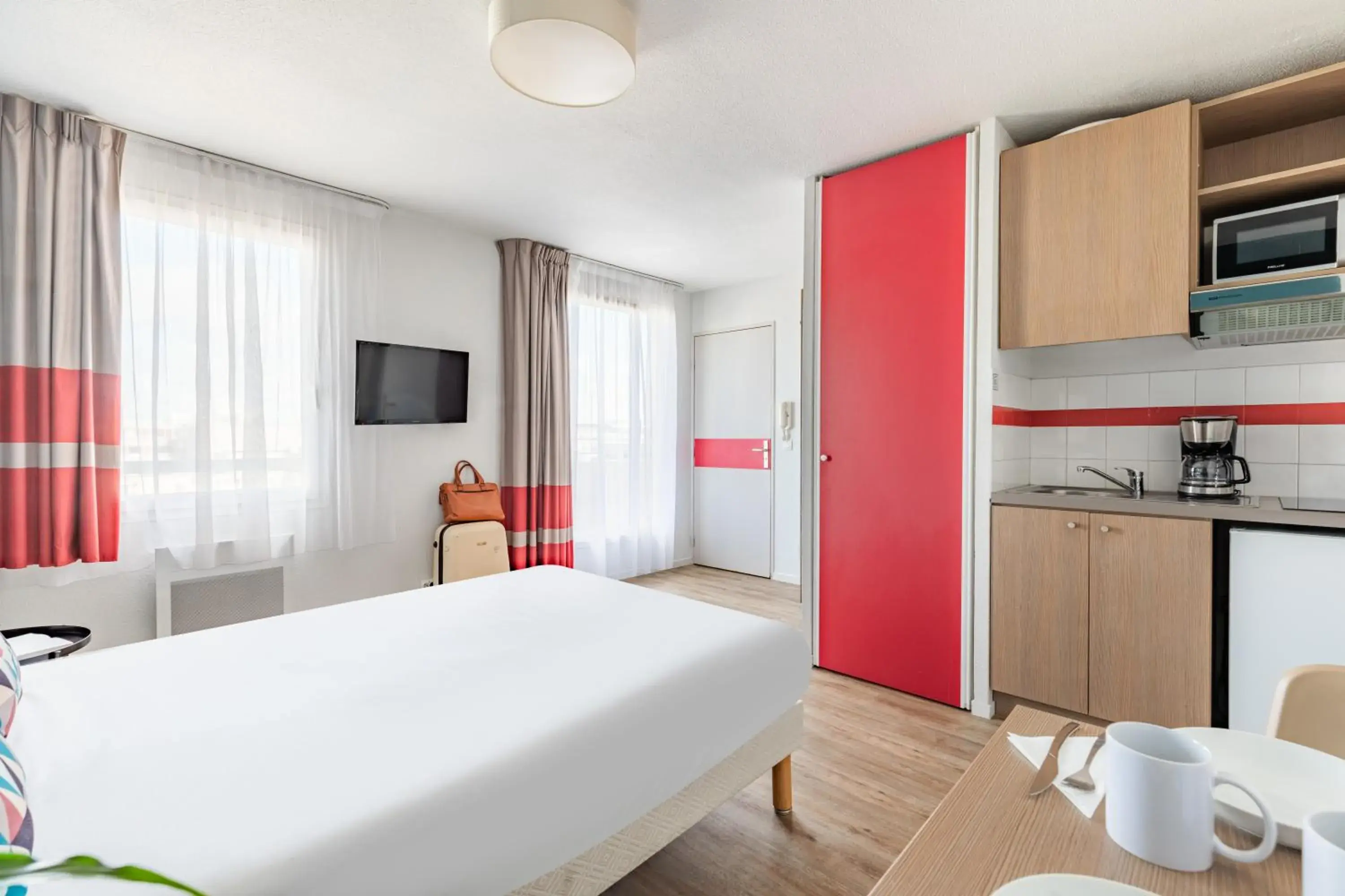 Bed in Appart'City Classic Paris La Villette Bed in Appart'City Classic Paris La Villette