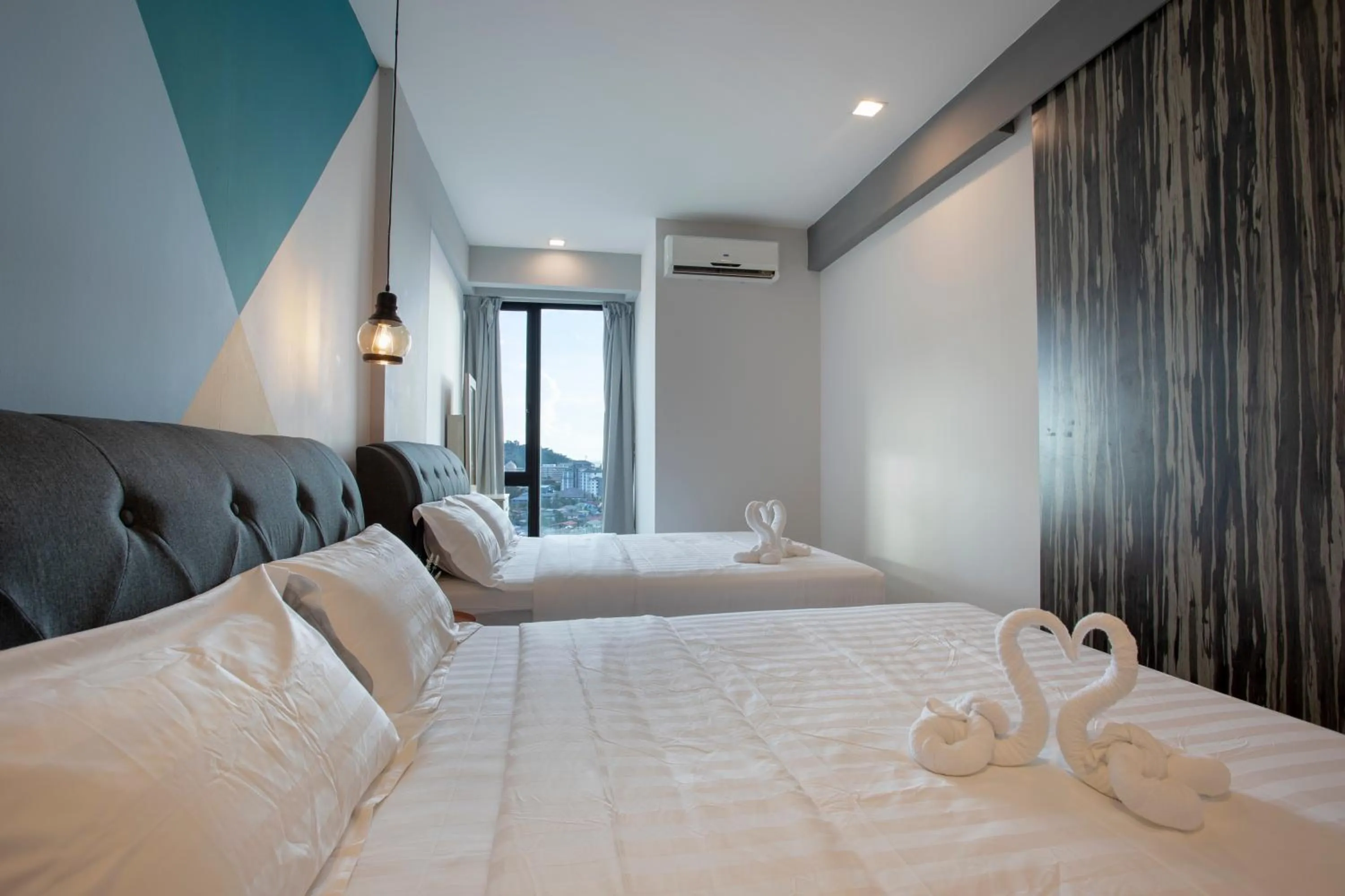 Bed in Cozy Living Sky Apartment