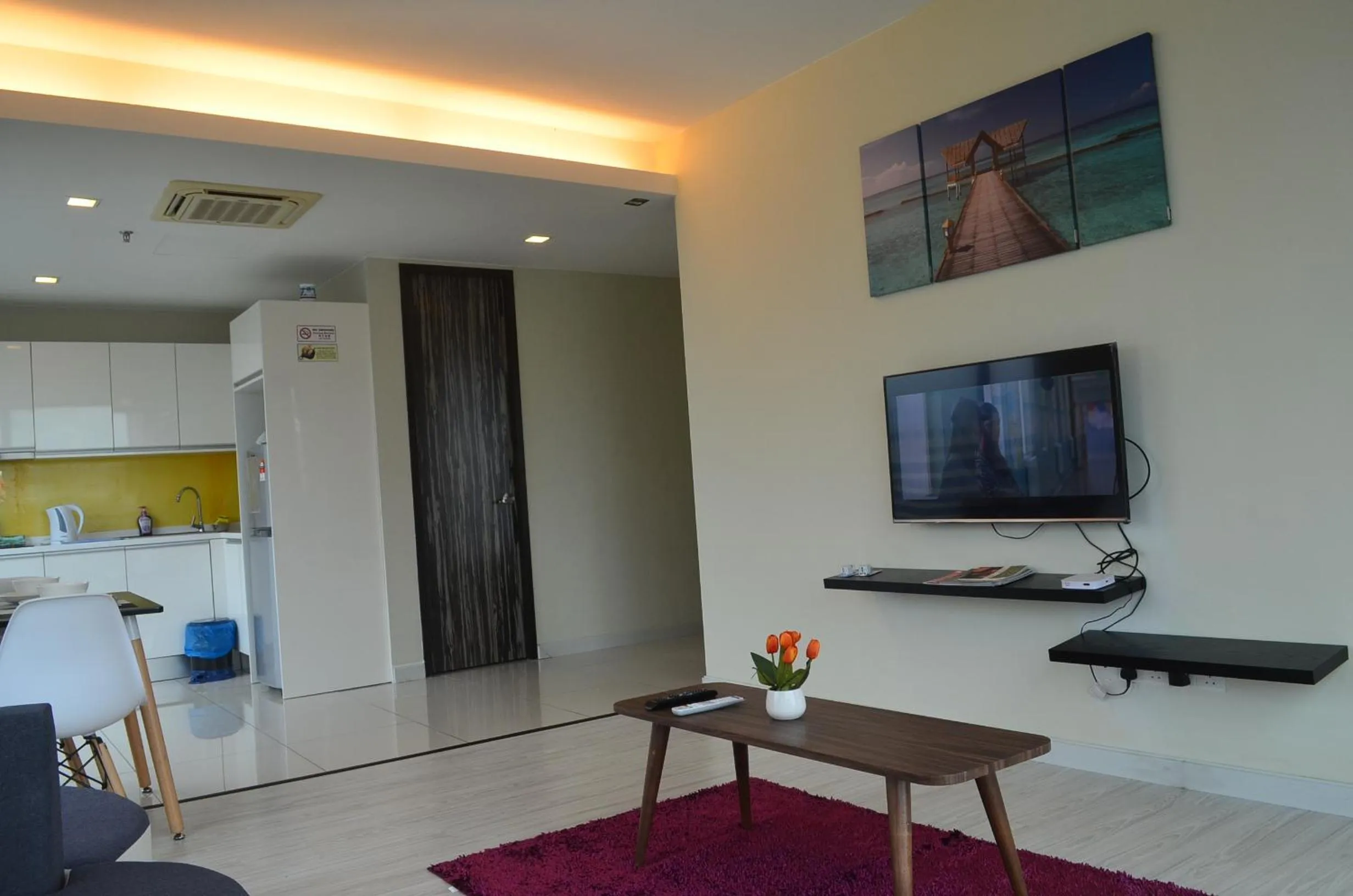 Living room in Cozy Living Sky Apartment