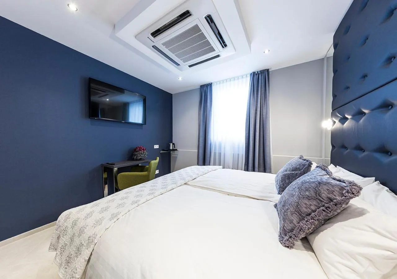 Bed in Hotel Tommasi