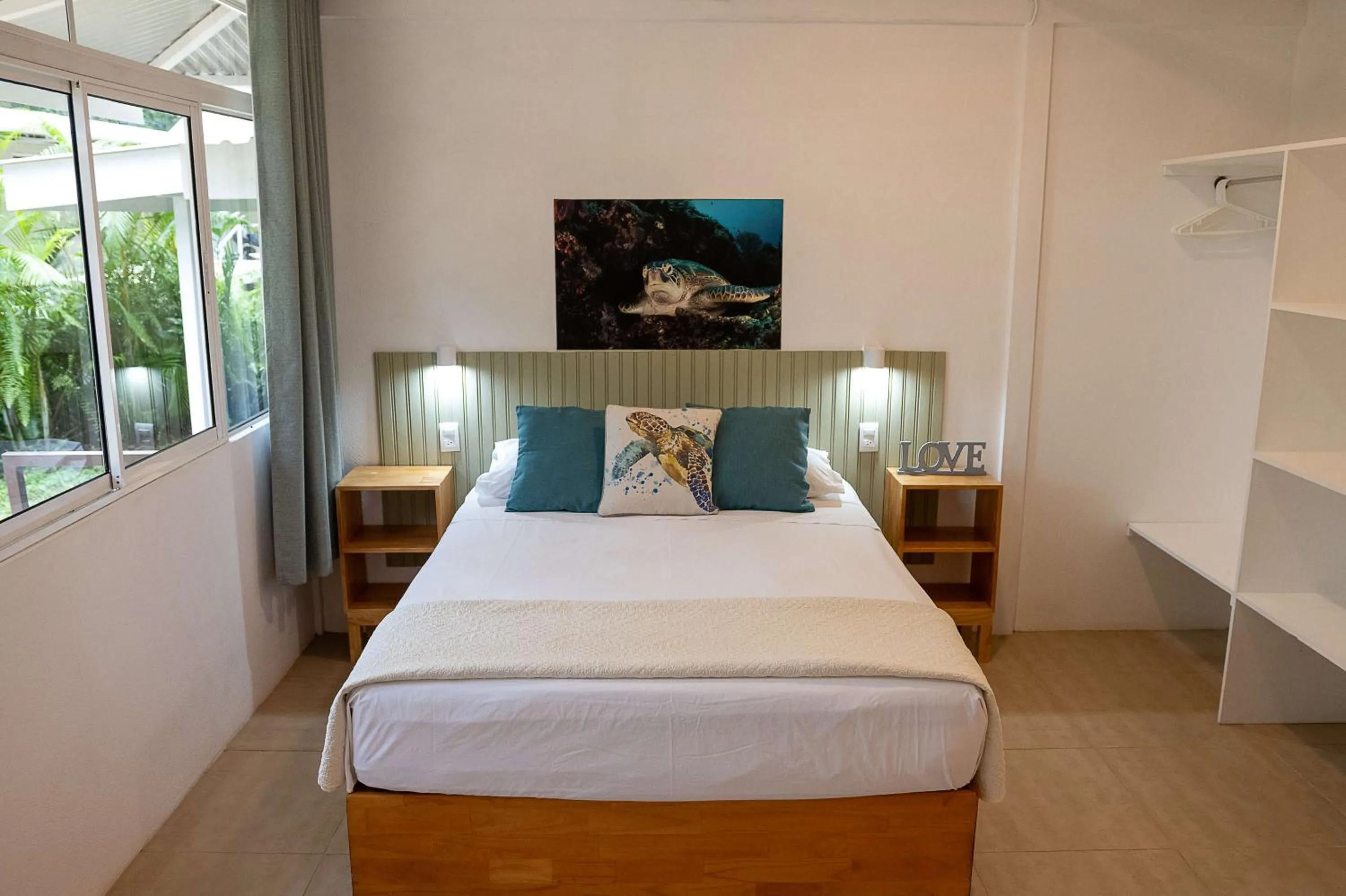 Bed in Jaguar Inn Bungalows