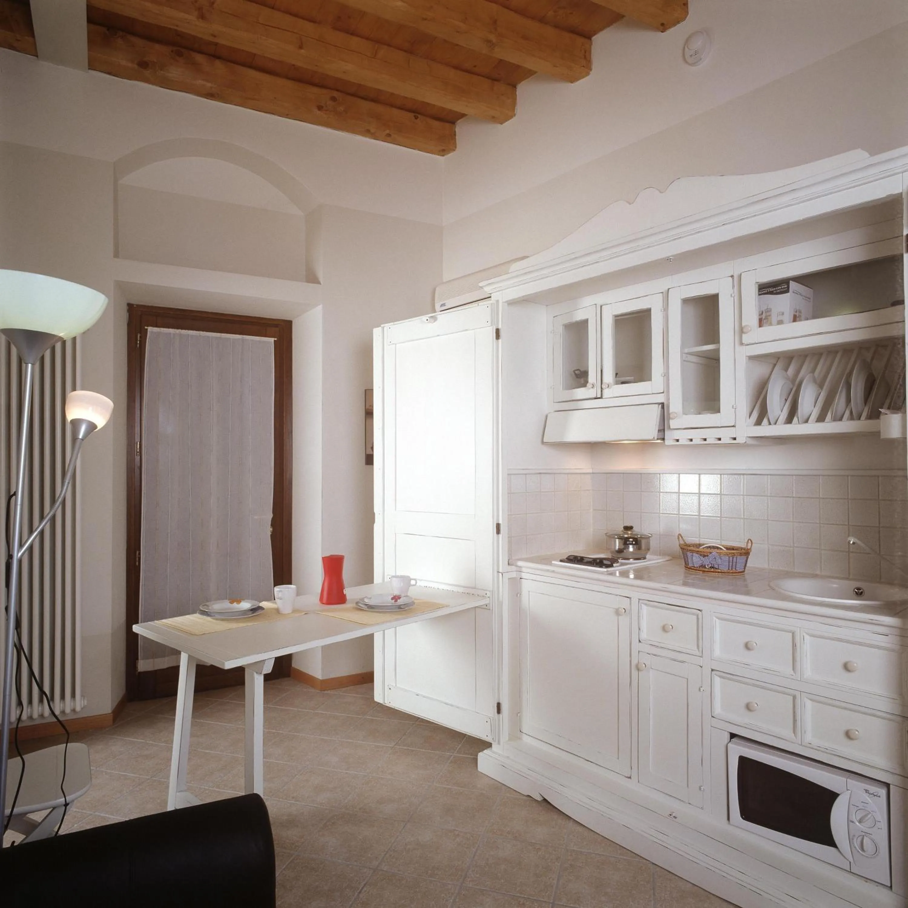 Kitchen or kitchenette in Hotel Mastino