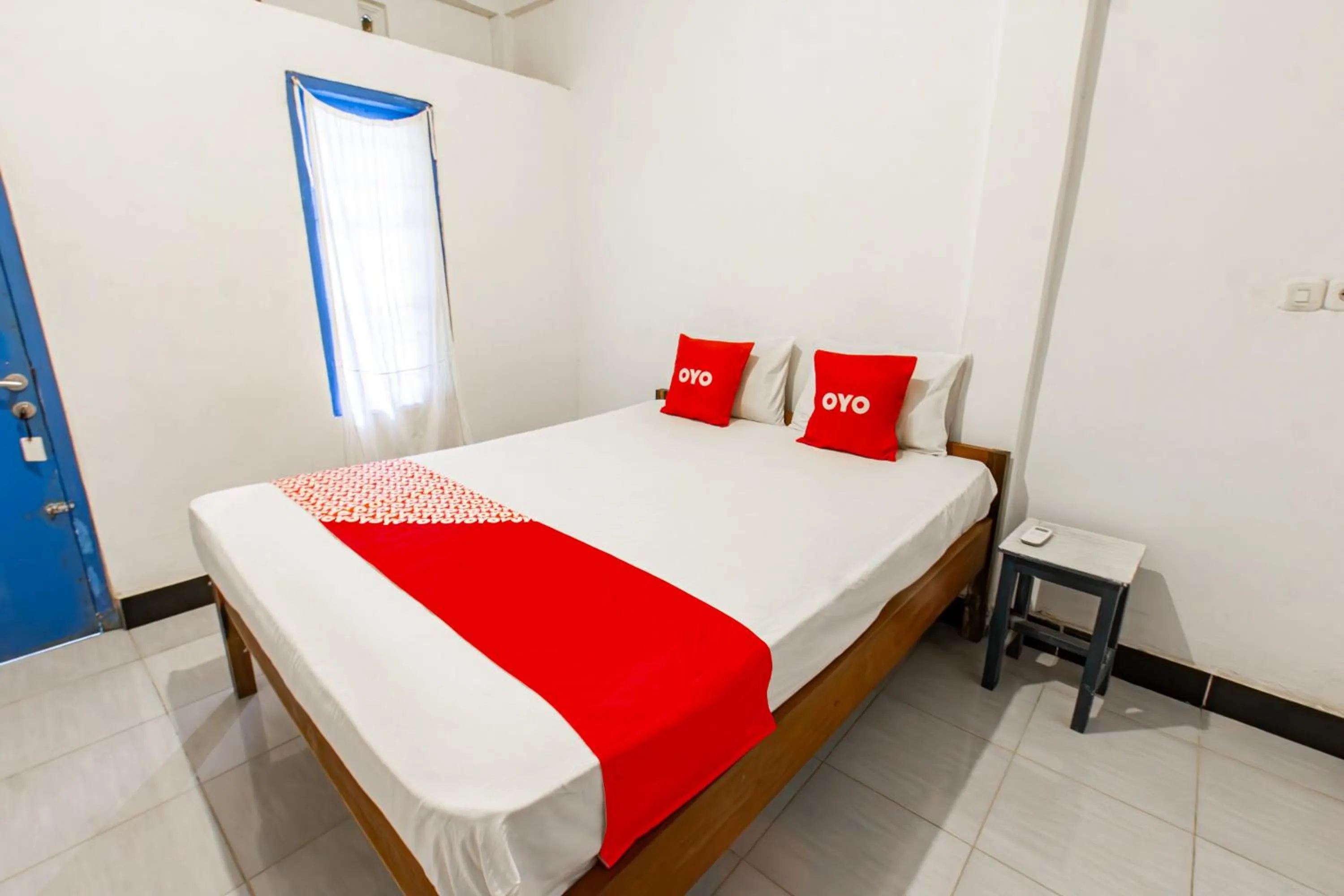 Bedroom, Bed in Hotel O Kawi Homestay