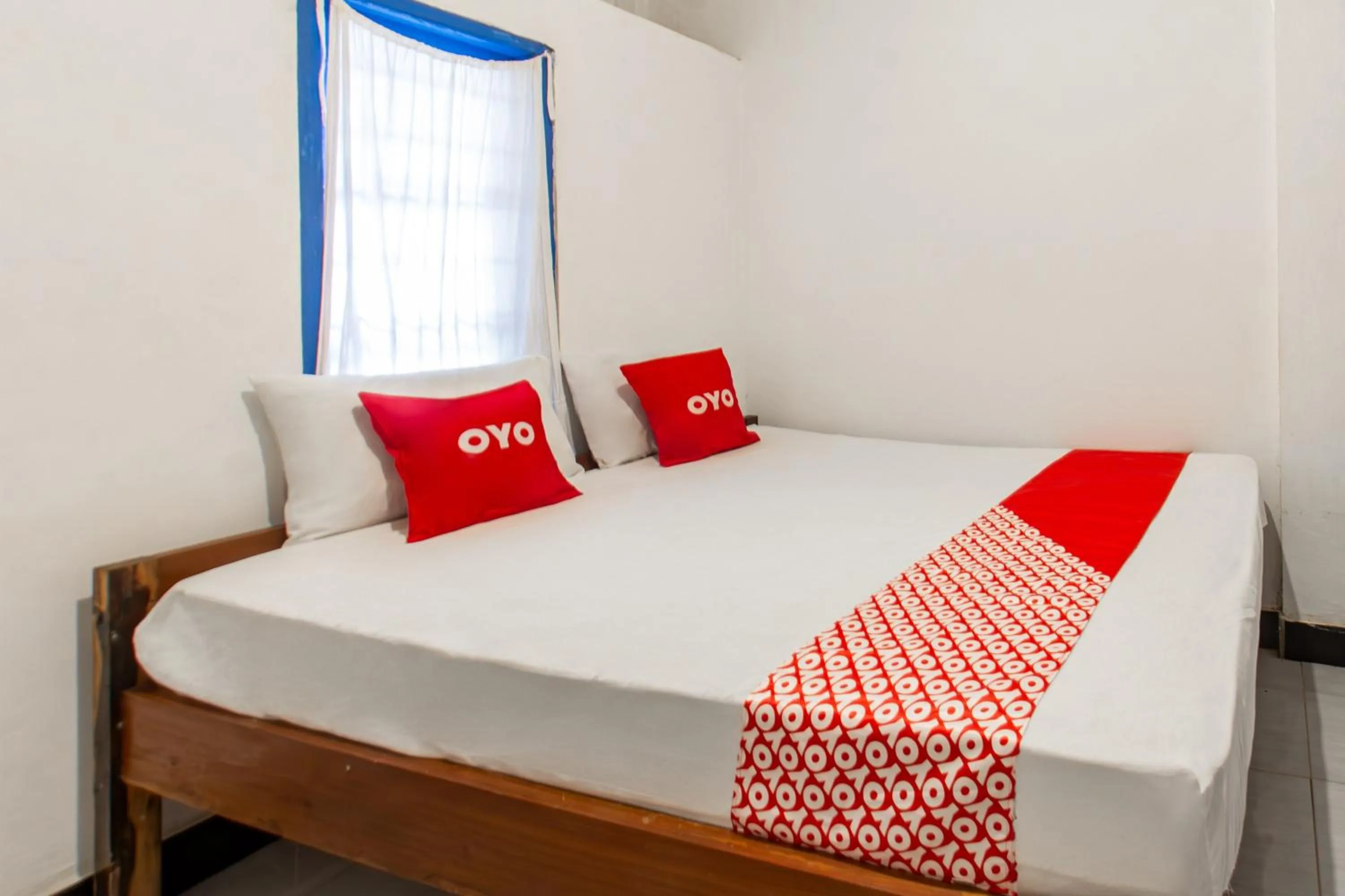 Bedroom, Bed in Hotel O Kawi Homestay