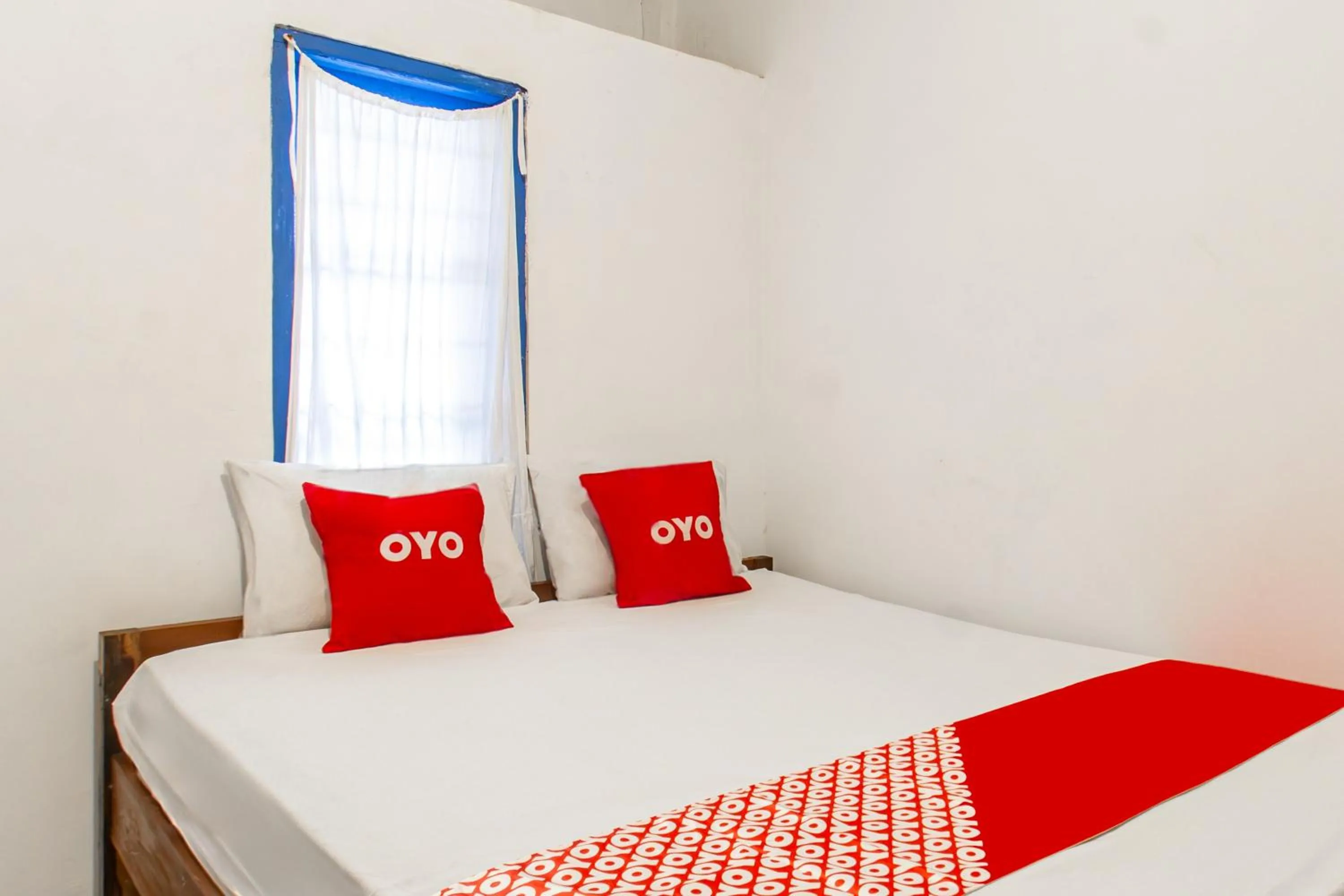 Bedroom, Bed in Hotel O Kawi Homestay