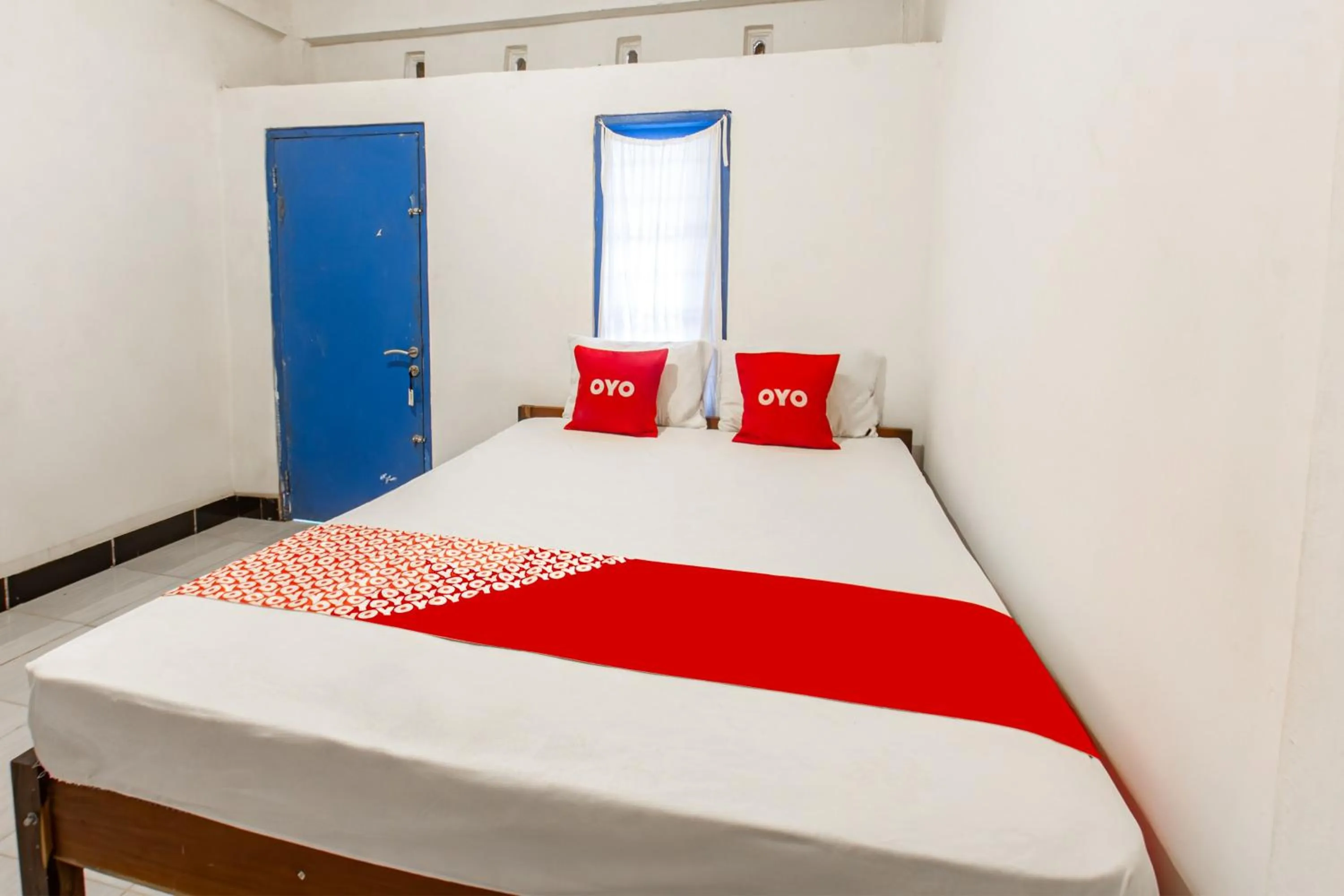 Bedroom, Bed in Hotel O Kawi Homestay