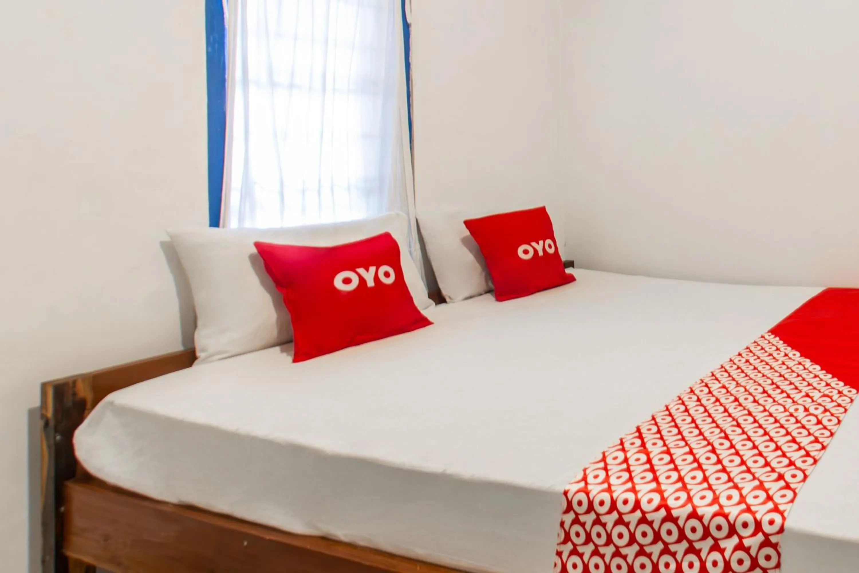 Bedroom, Bed in Hotel O Kawi Homestay