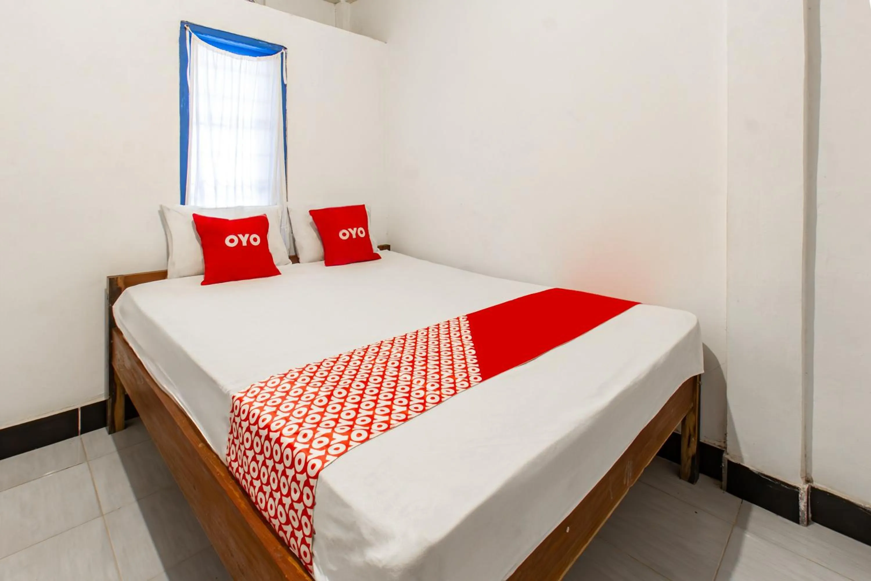 Bedroom, Bed in Hotel O Kawi Homestay