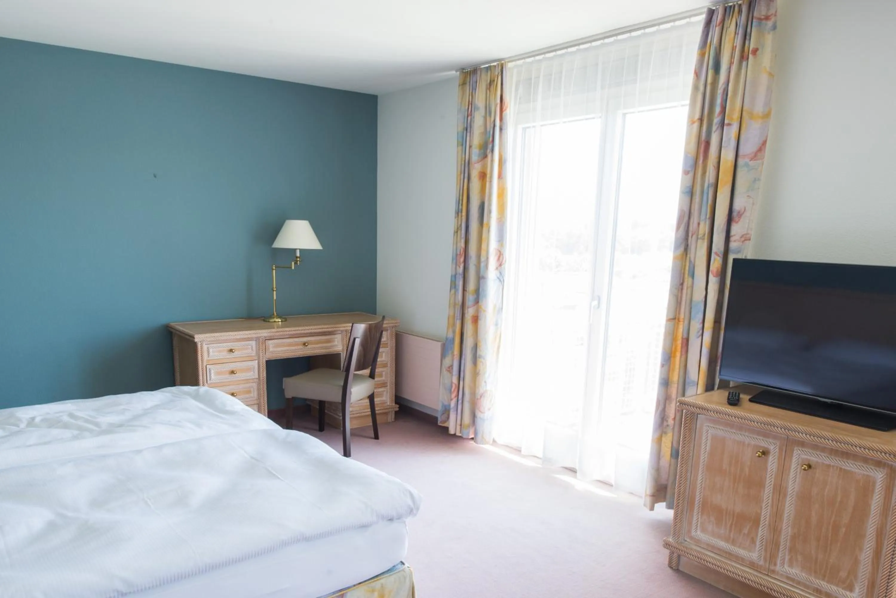 Bed in Ascott Hotel & Restaurant