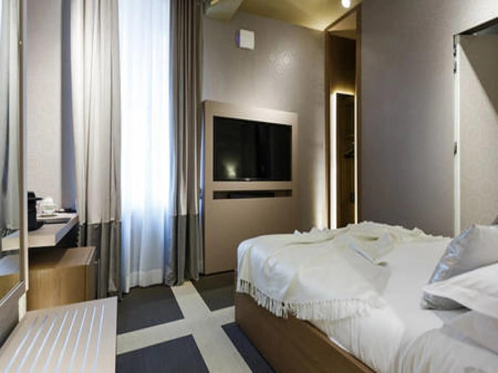 Bed in Private Luxury Suites