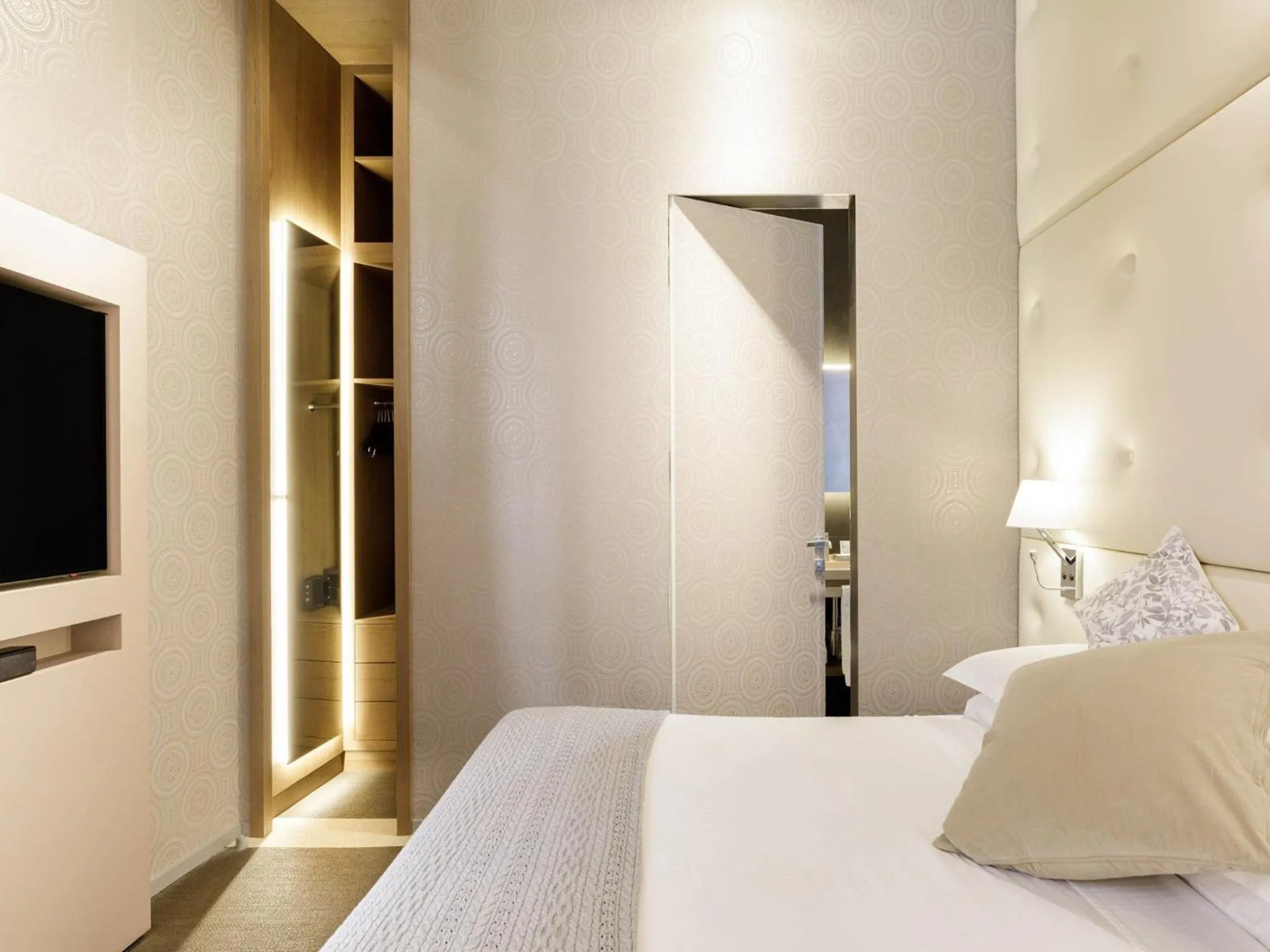 Bed in Private Luxury Suites
