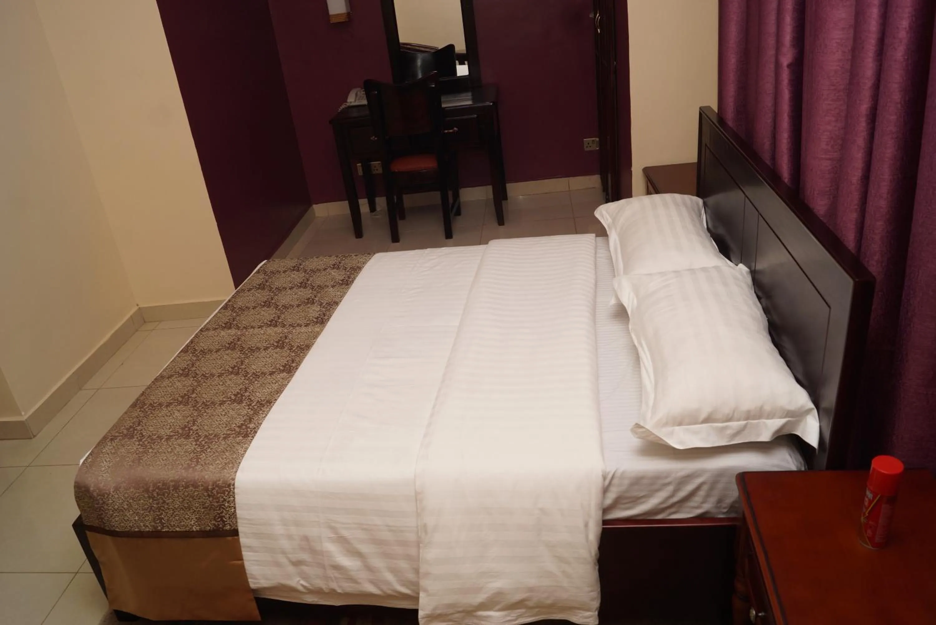 Bed in Diamonds Hotel Kampala