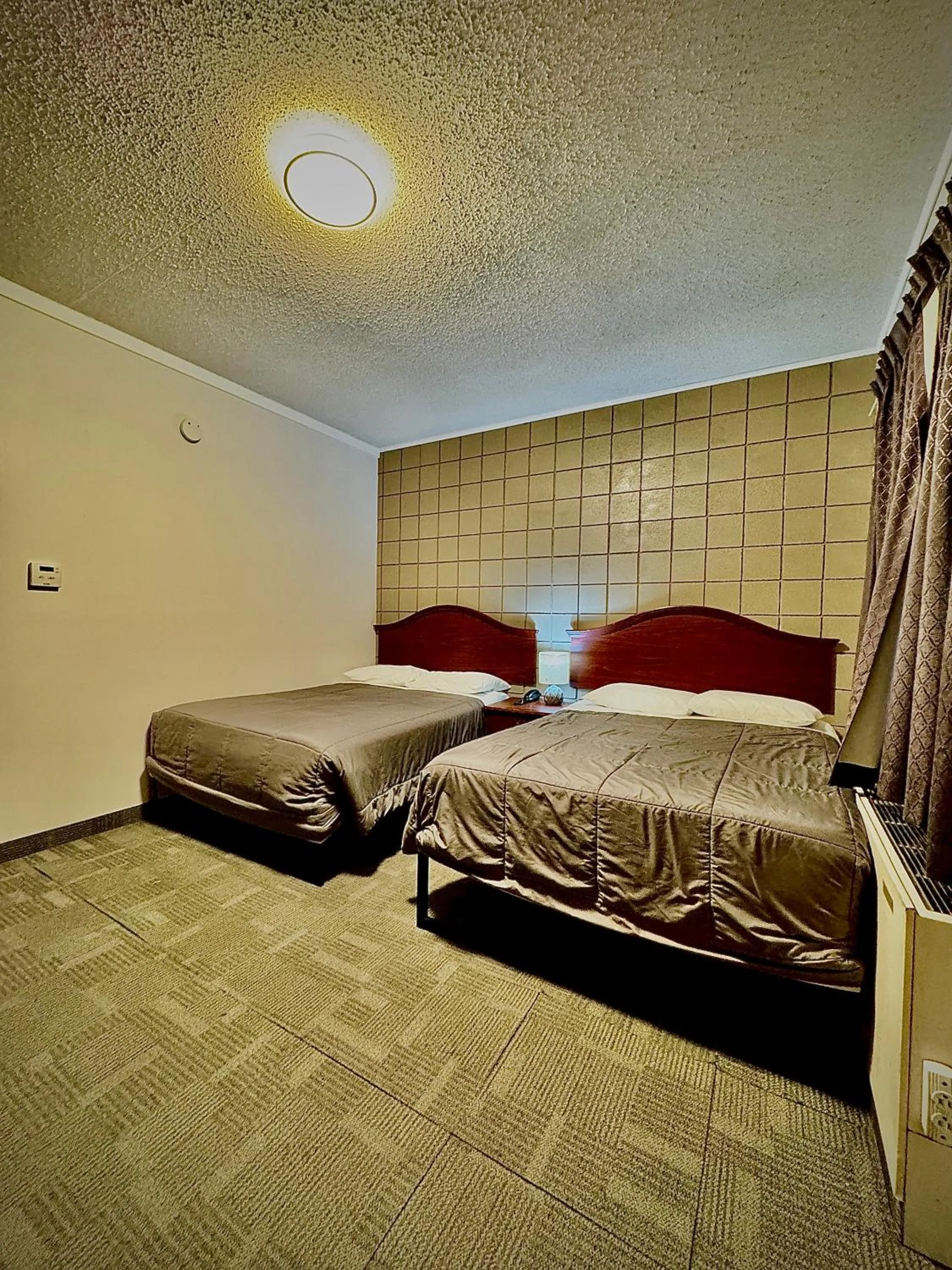 Bed in Caravel Motel