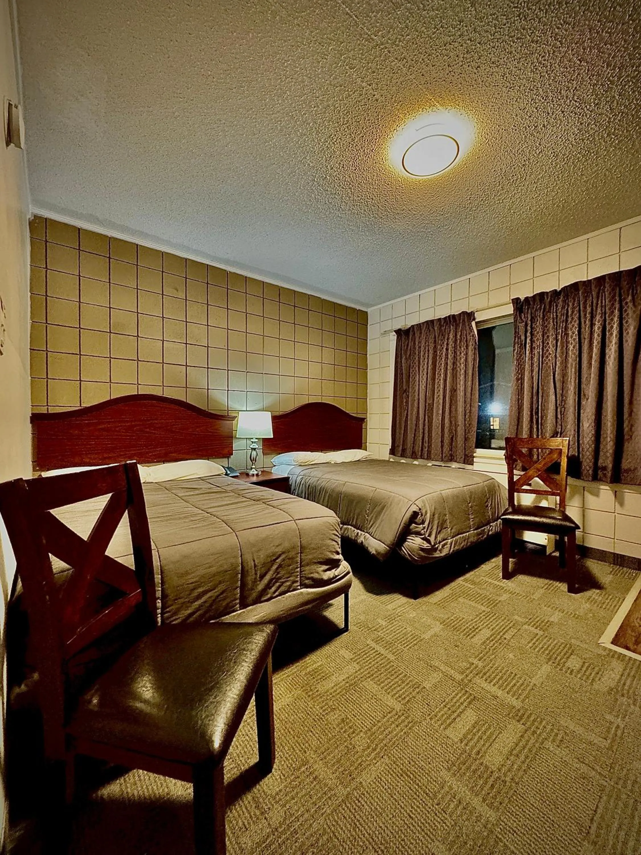 Bed in Caravel Motel