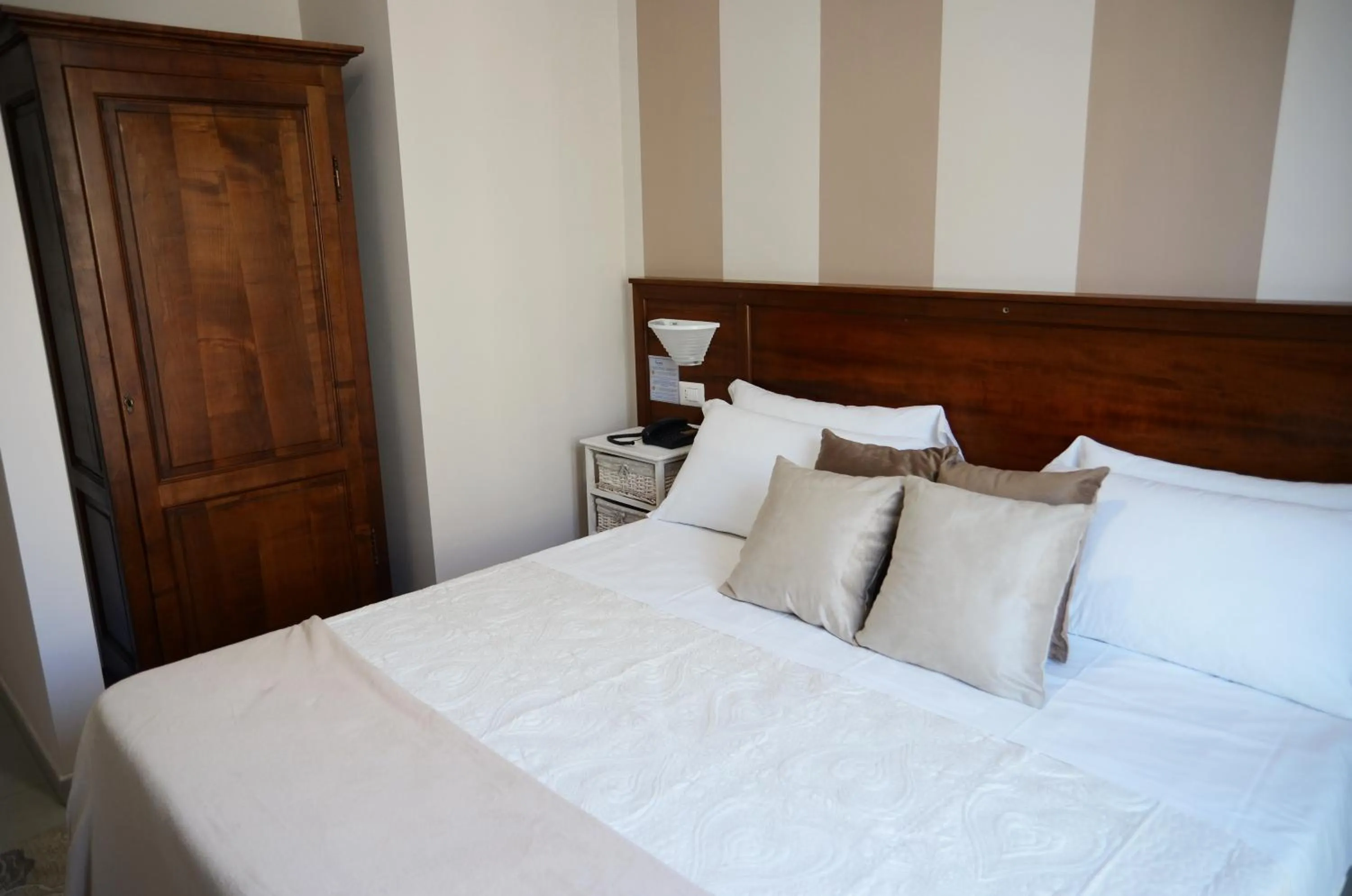 Bed in Hotel Giulio Cesare