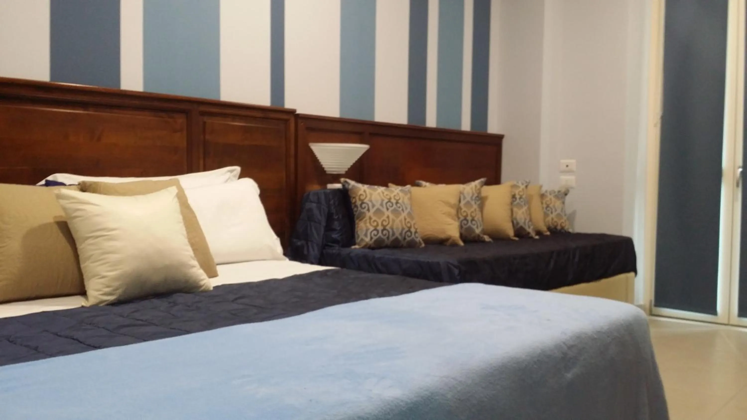 Bedroom, Bed in Hotel Giulio Cesare