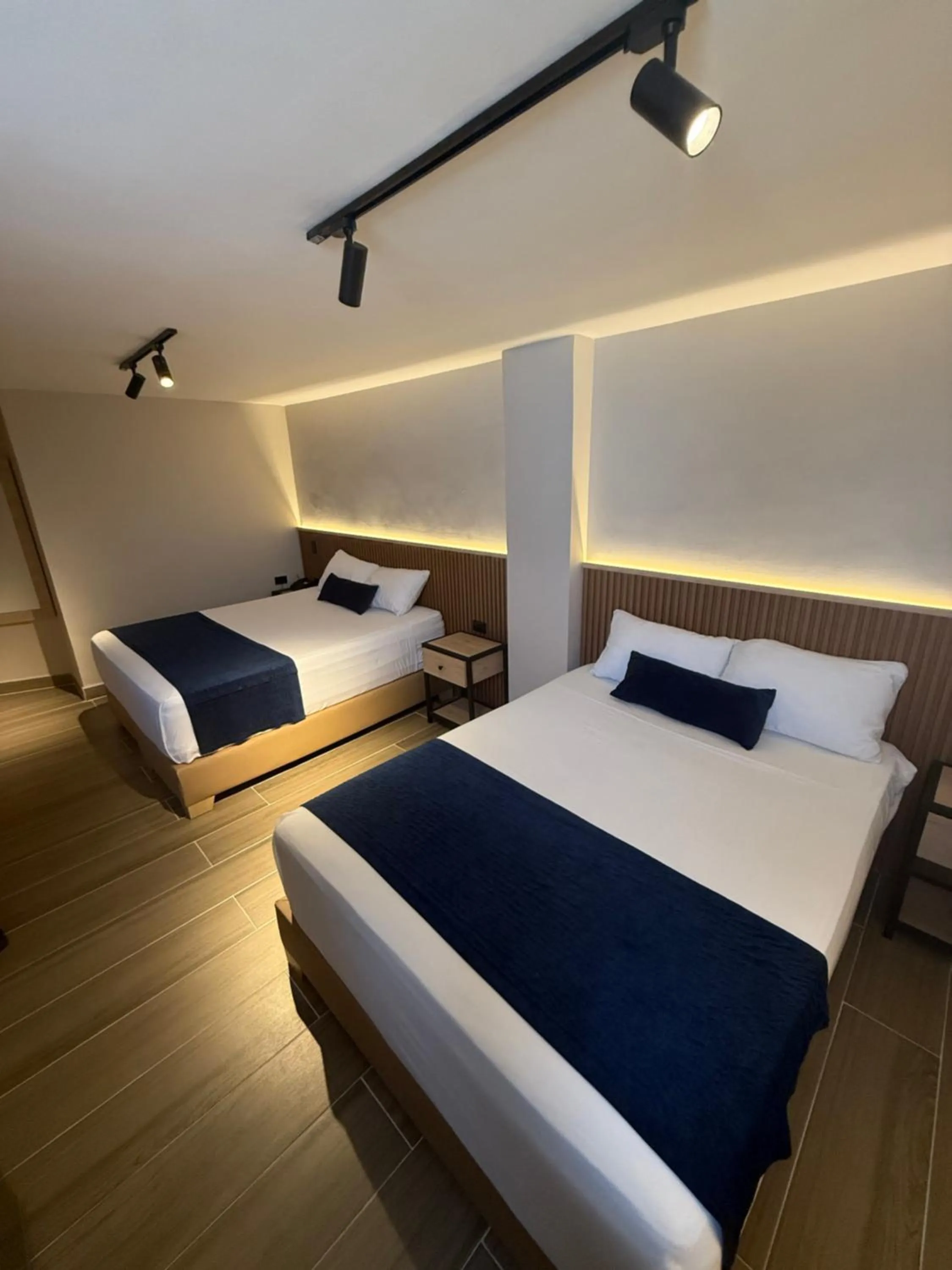 Bed in Hotel Suramericana