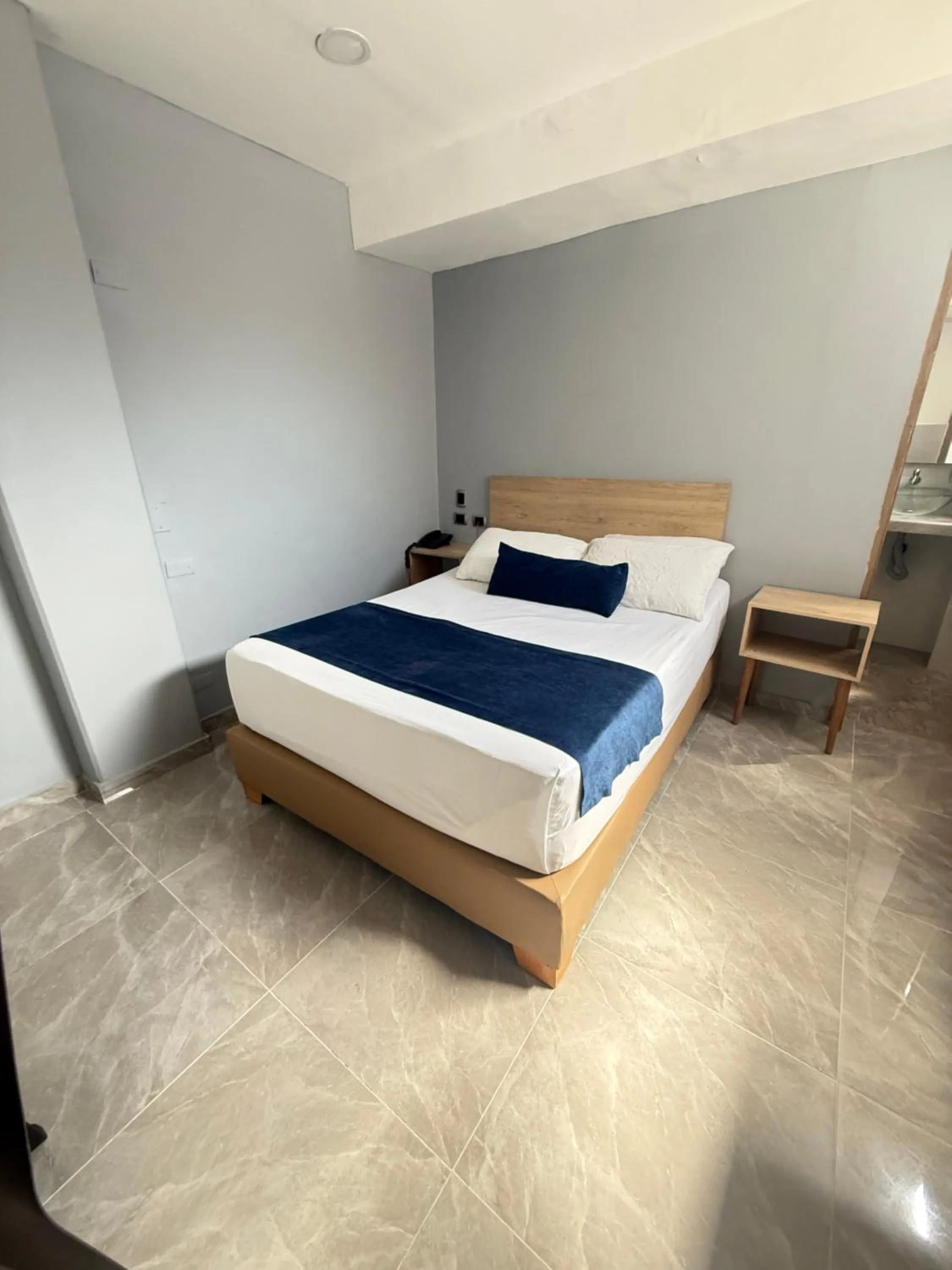 Bed in Hotel Suramericana