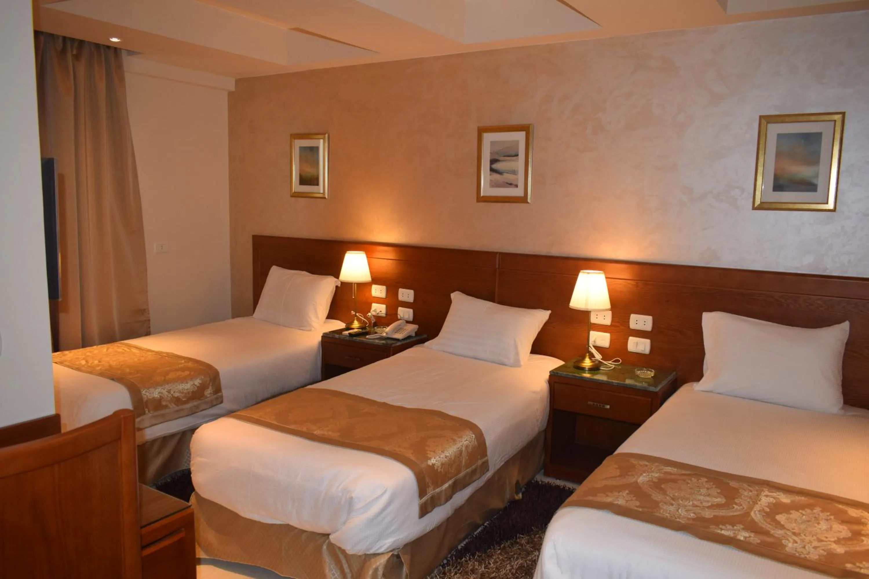 Bed in Omar El Khayam Al Minya Hotel