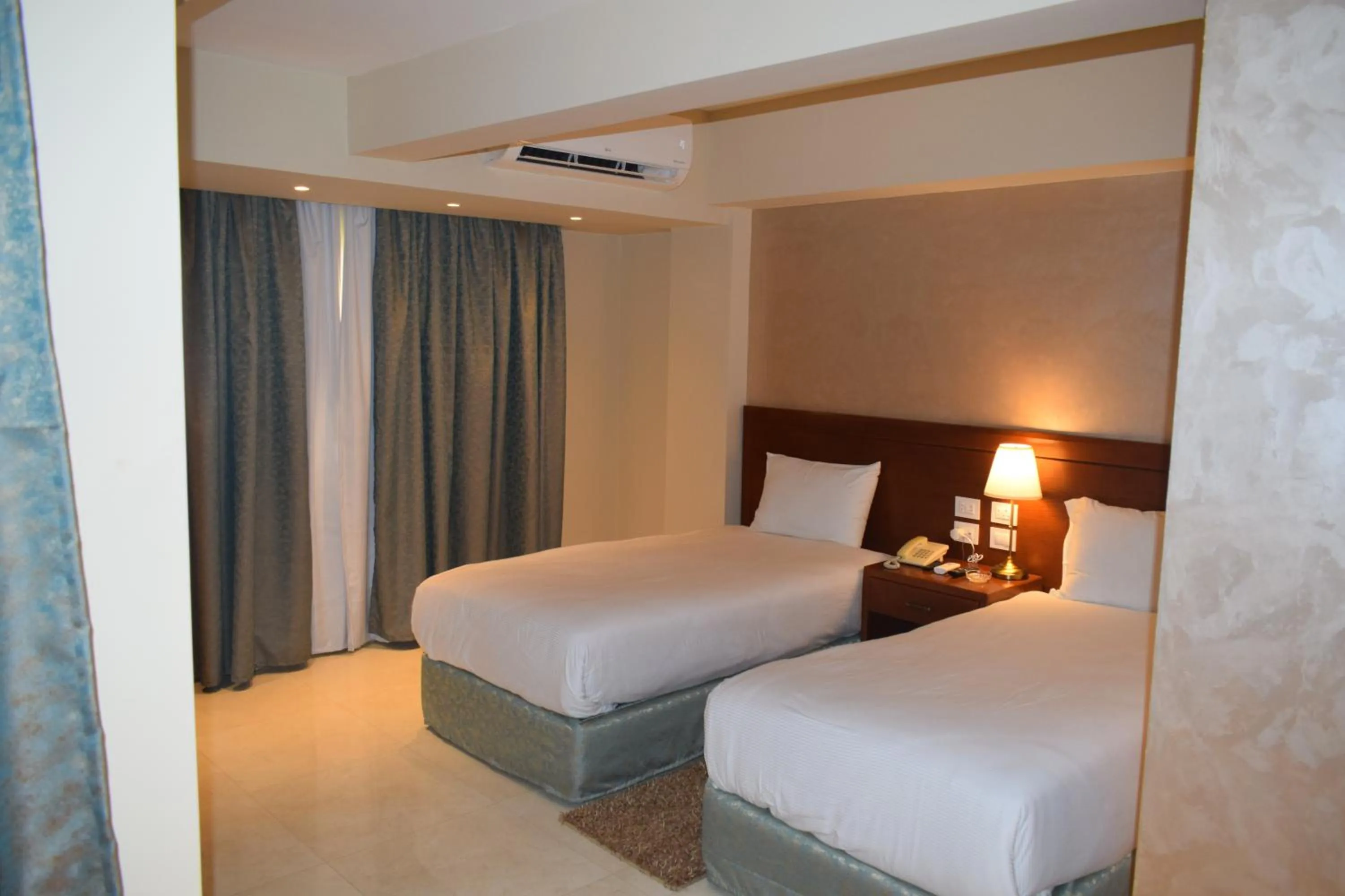 Photo of the whole room, Bed in Omar El Khayam Al Minya Hotel