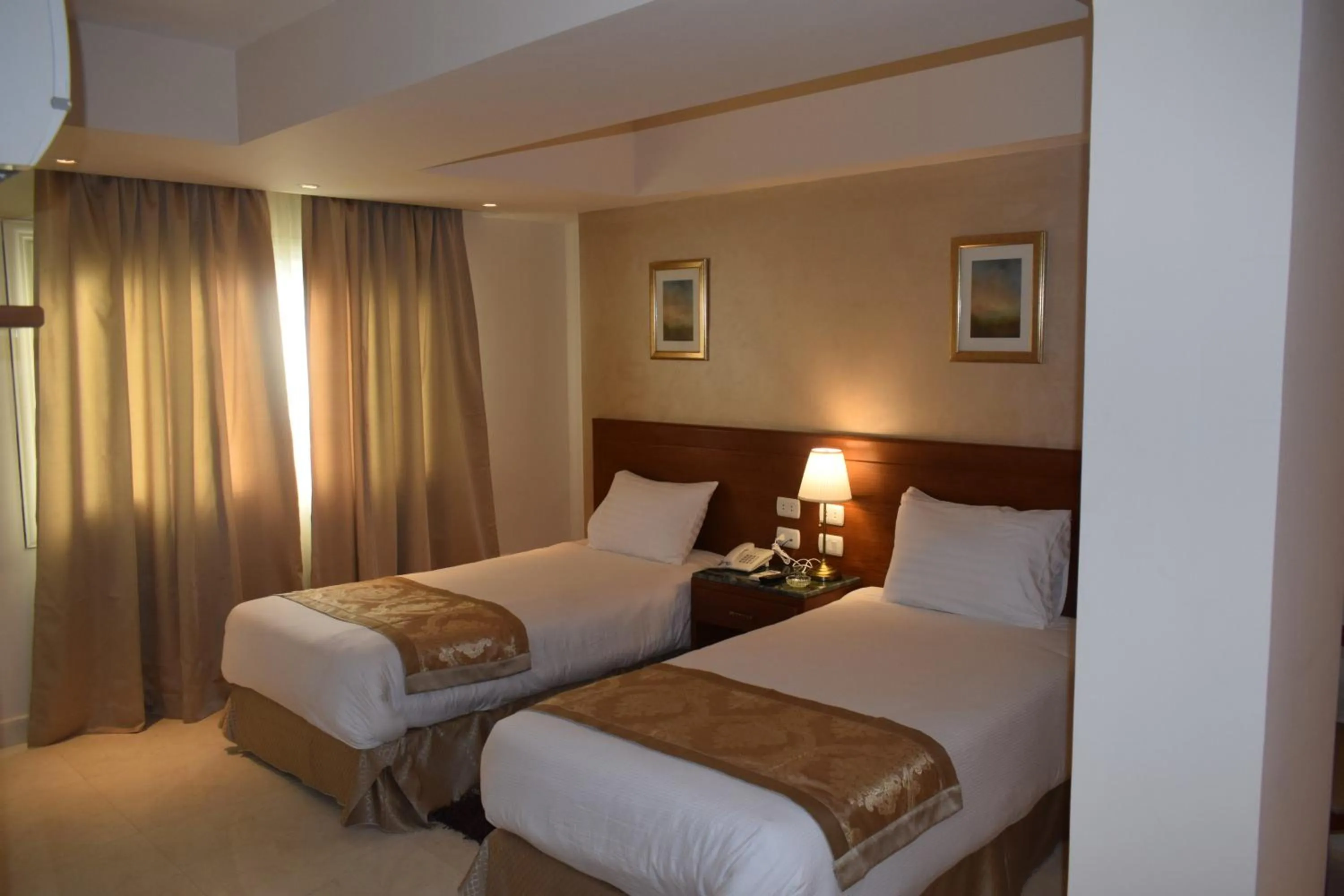 Bed in Omar El Khayam Al Minya Hotel