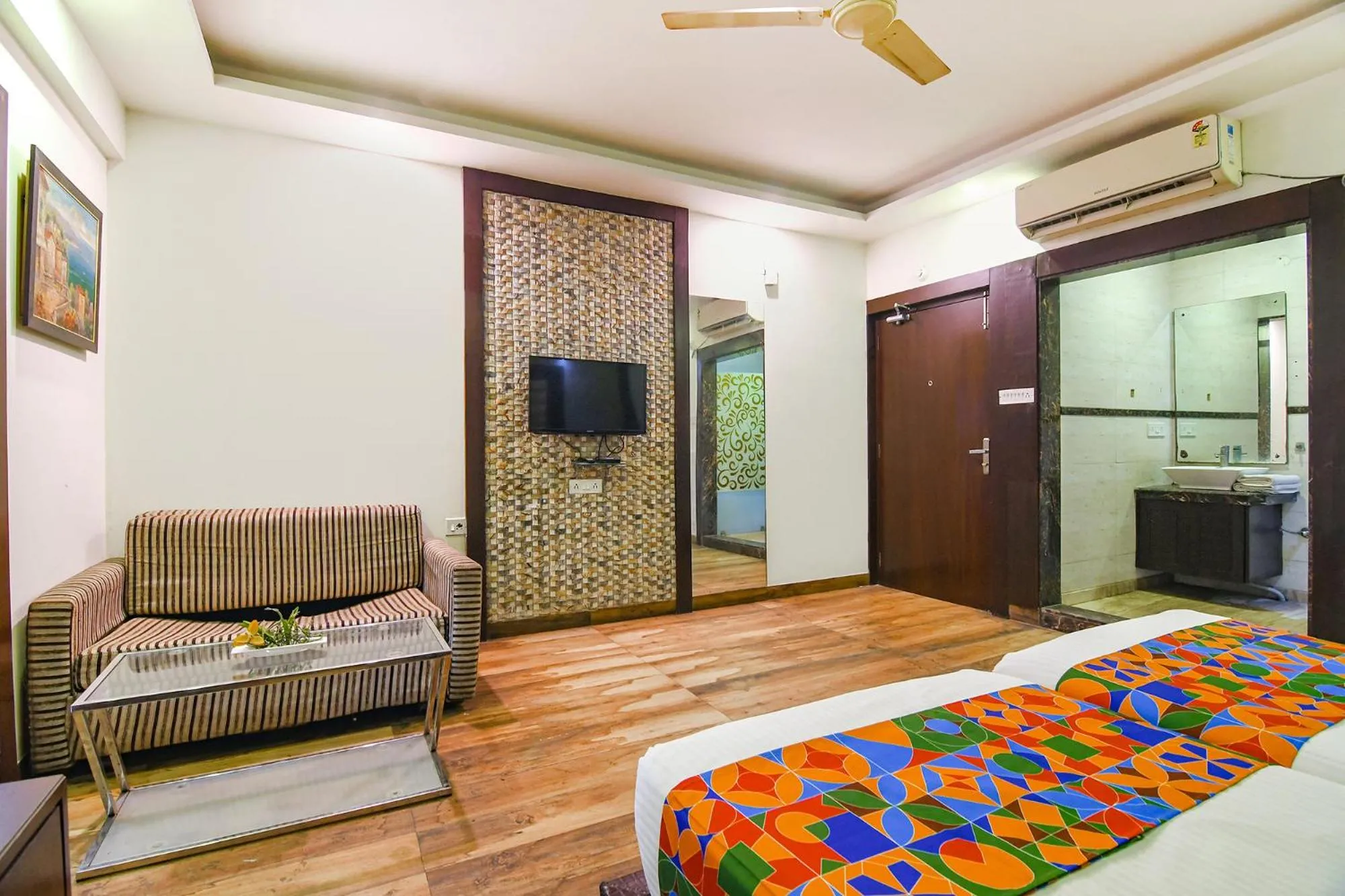 Seating area, Bed in FabHotel Prime Goodwill