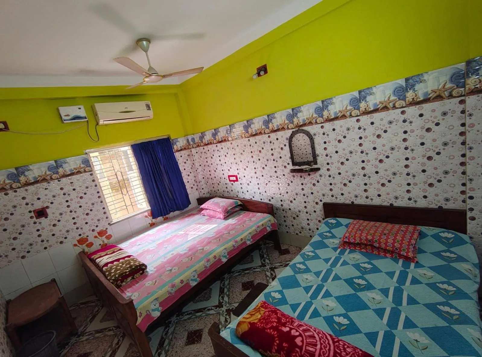 Bed in Jagannath Guest House